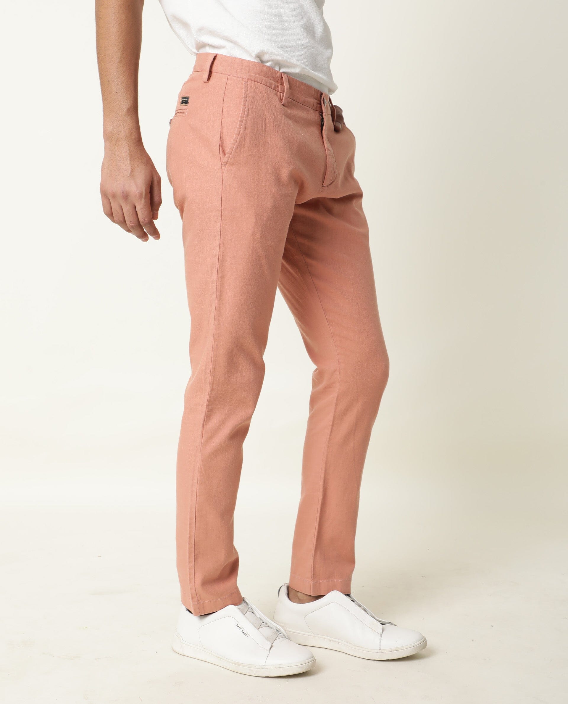 Rare Rabbit Men's Corn Pink Solid Mid-Rise Regular Fit Stretch Trouser