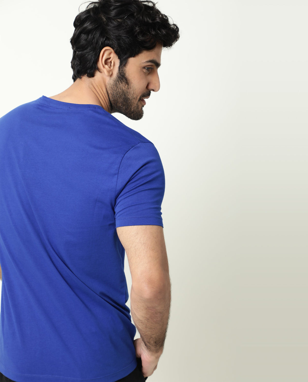 Rare Rabbit Men's Trix Fluorescent Blue Cotton Fabric Crew Neck Half Sleeves Slim Fit Velvet Badge Solid T-Shirt