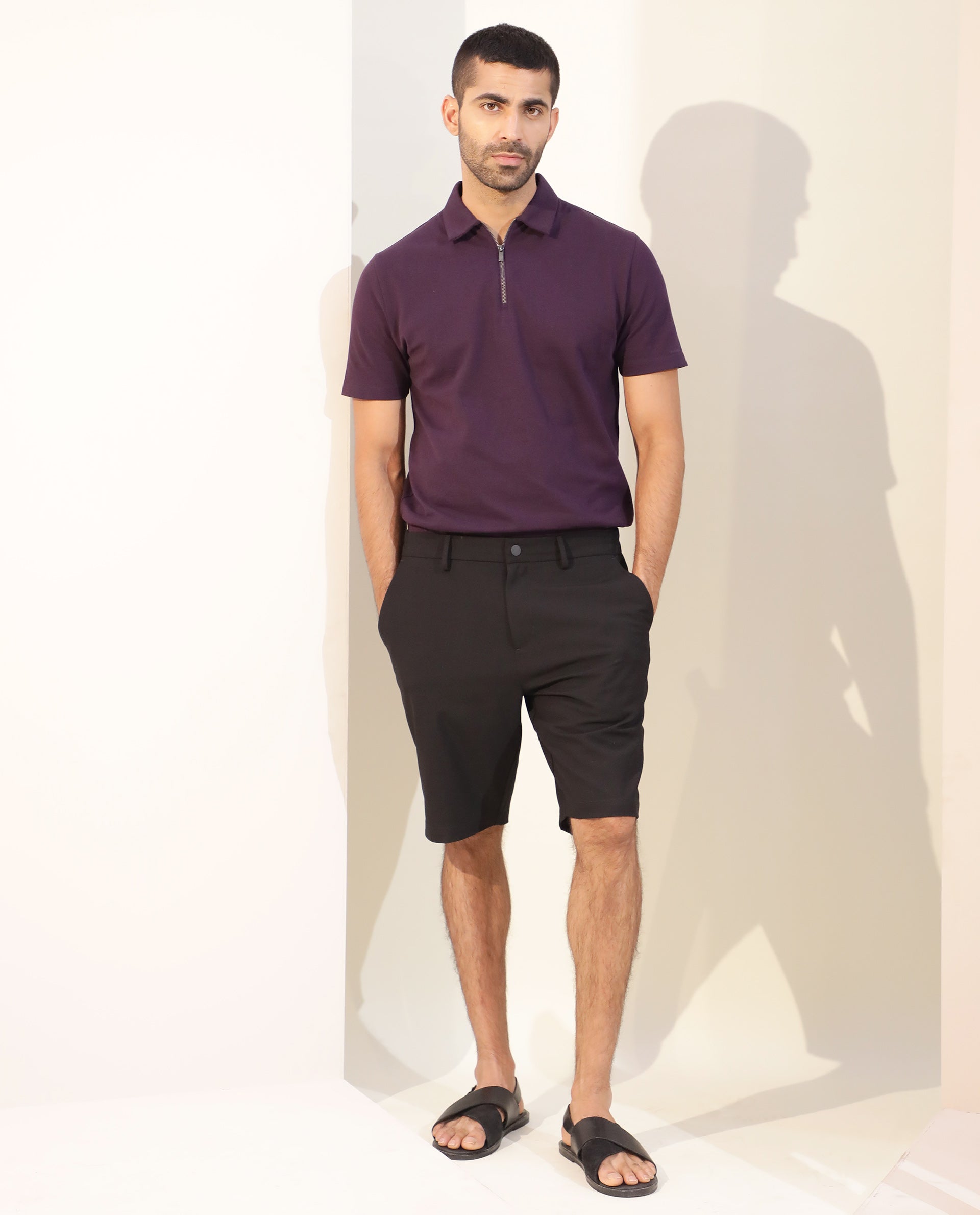 Rare Rabbit Mens Trip Black Mid Rise Regular Fit Solid Shorts