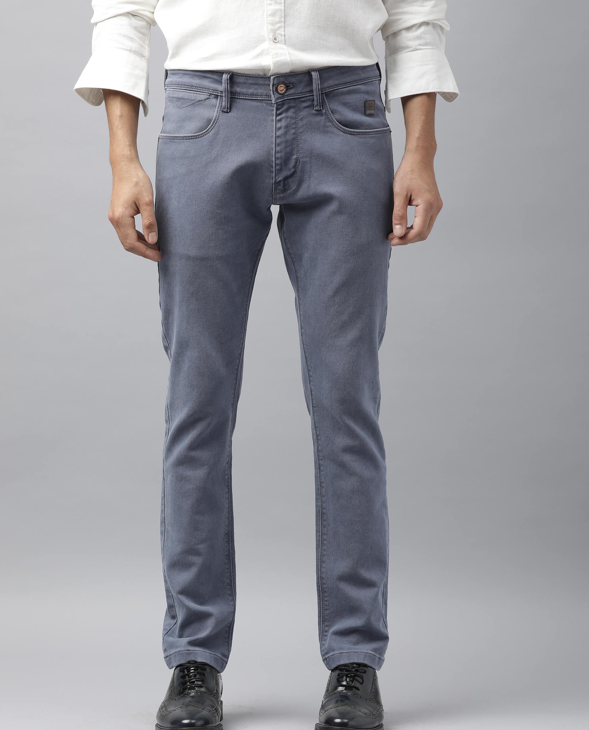 Rare Rabbit Men's Luna Pastel Purple Garment Dyed Mid-Rise Jeans