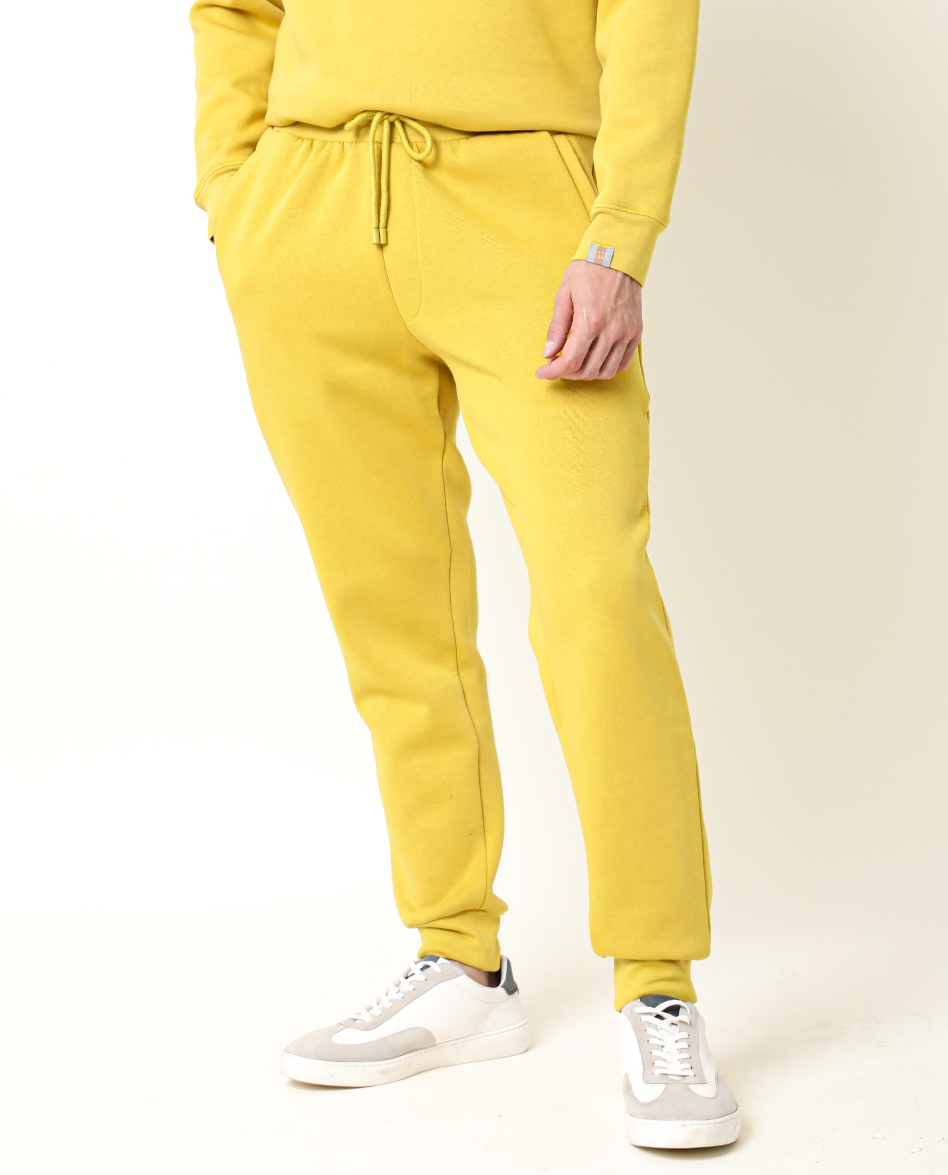Rare Rabbit Men's Chase Mustard Cotton Polyester Fabric Slim Fit Mid Rise Track Pant