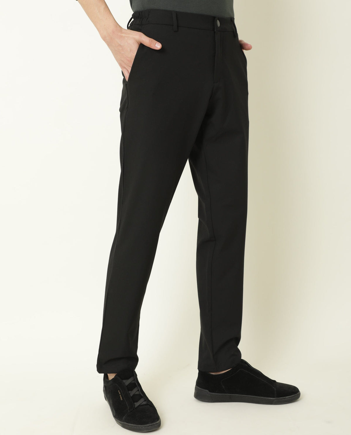 Rare Rabbit Men's Travel-2 Black Solid Mid-Rise Slim Fit Stretch Trousers