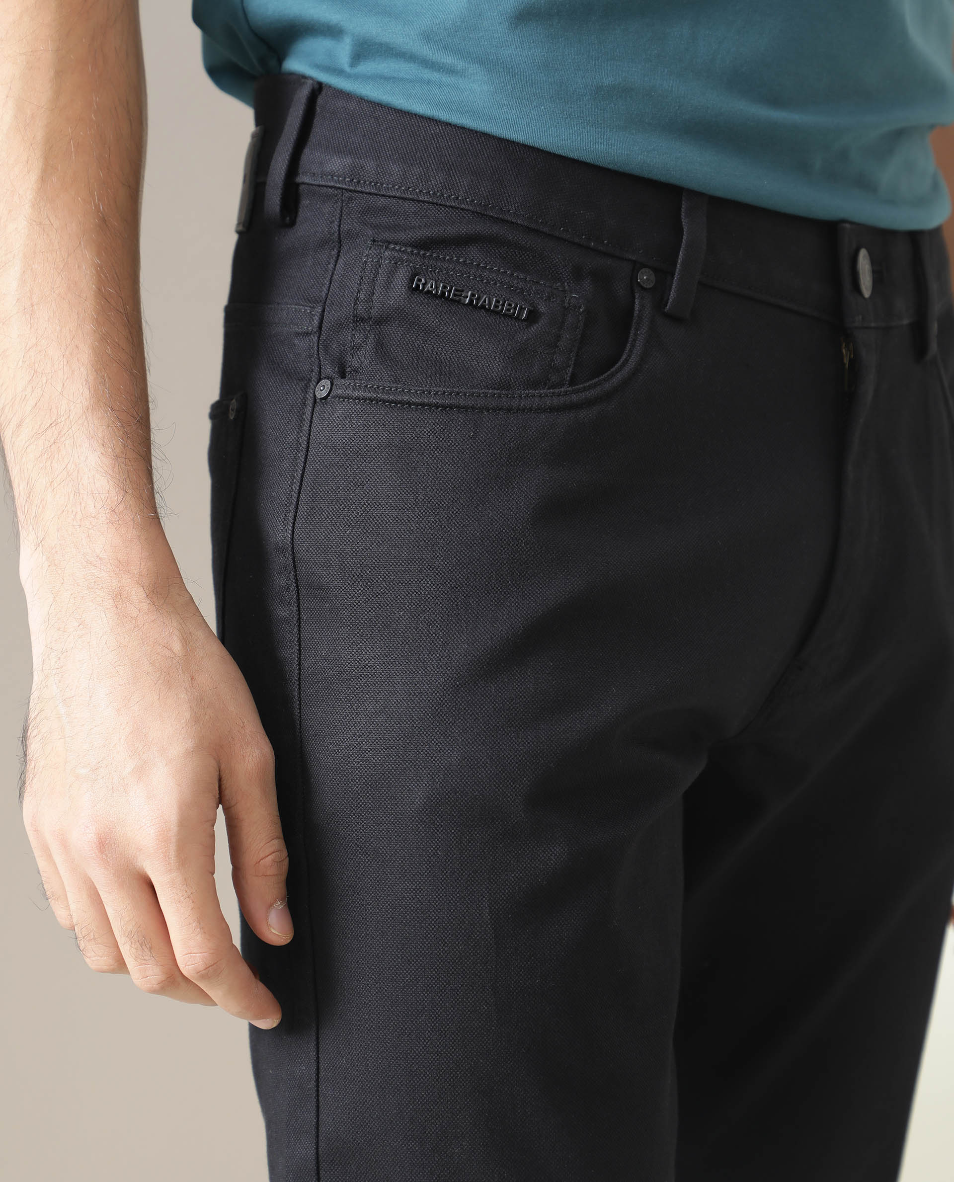 Rare Rabbit Men's Poke Black Solid Mid-Rise Regular Fit Trouser
