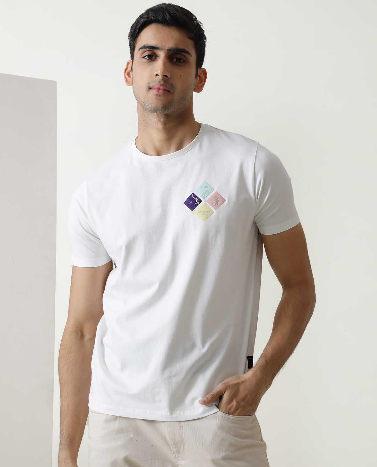 Rare Rabbit Men's Badget White Cotton Lycra Fabric Crew Neck Half Sleeves Regular Fit Graphic Print Branding T-Shirt