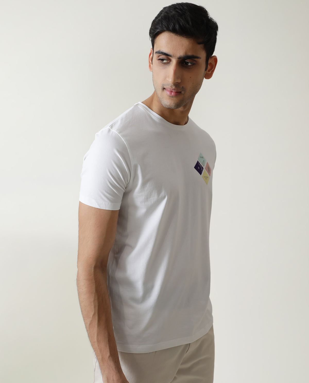Rare Rabbit Men's Badget White Cotton Lycra Fabric Crew Neck Half Sleeves Regular Fit Graphic Print Branding T-Shirt