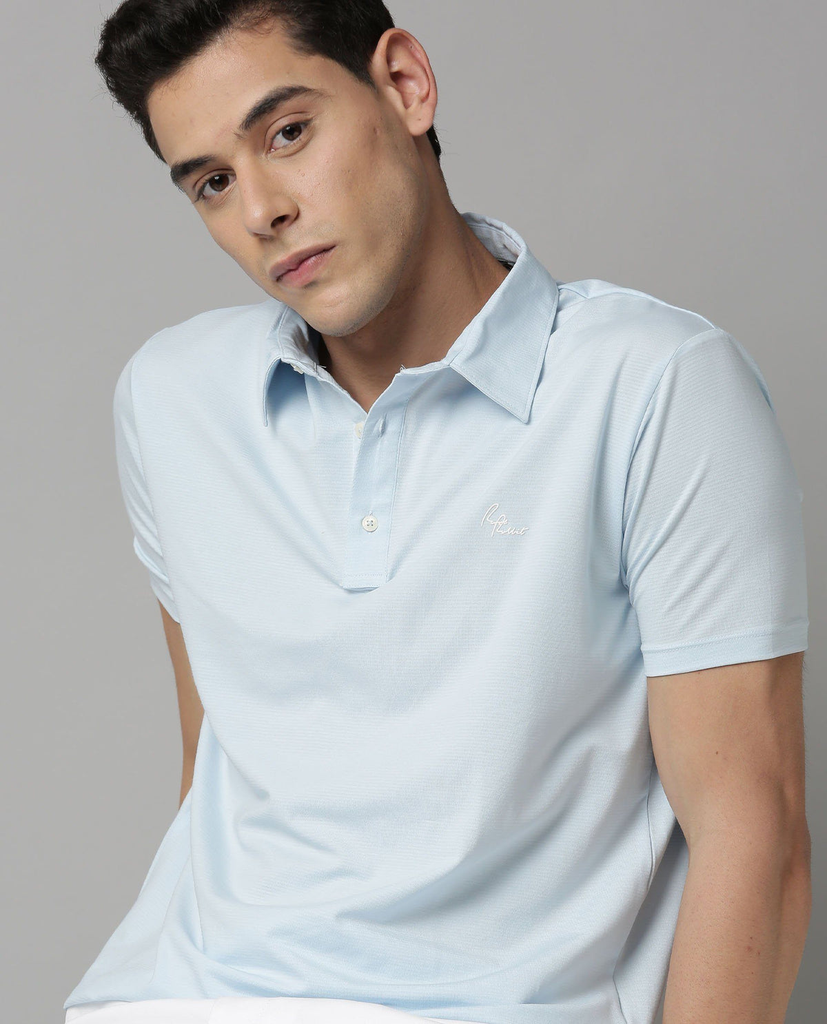 Rare Rabbit Men's Sailor Blue Solid Cotton Fabric Collared Neck Half-Sleeve Polo