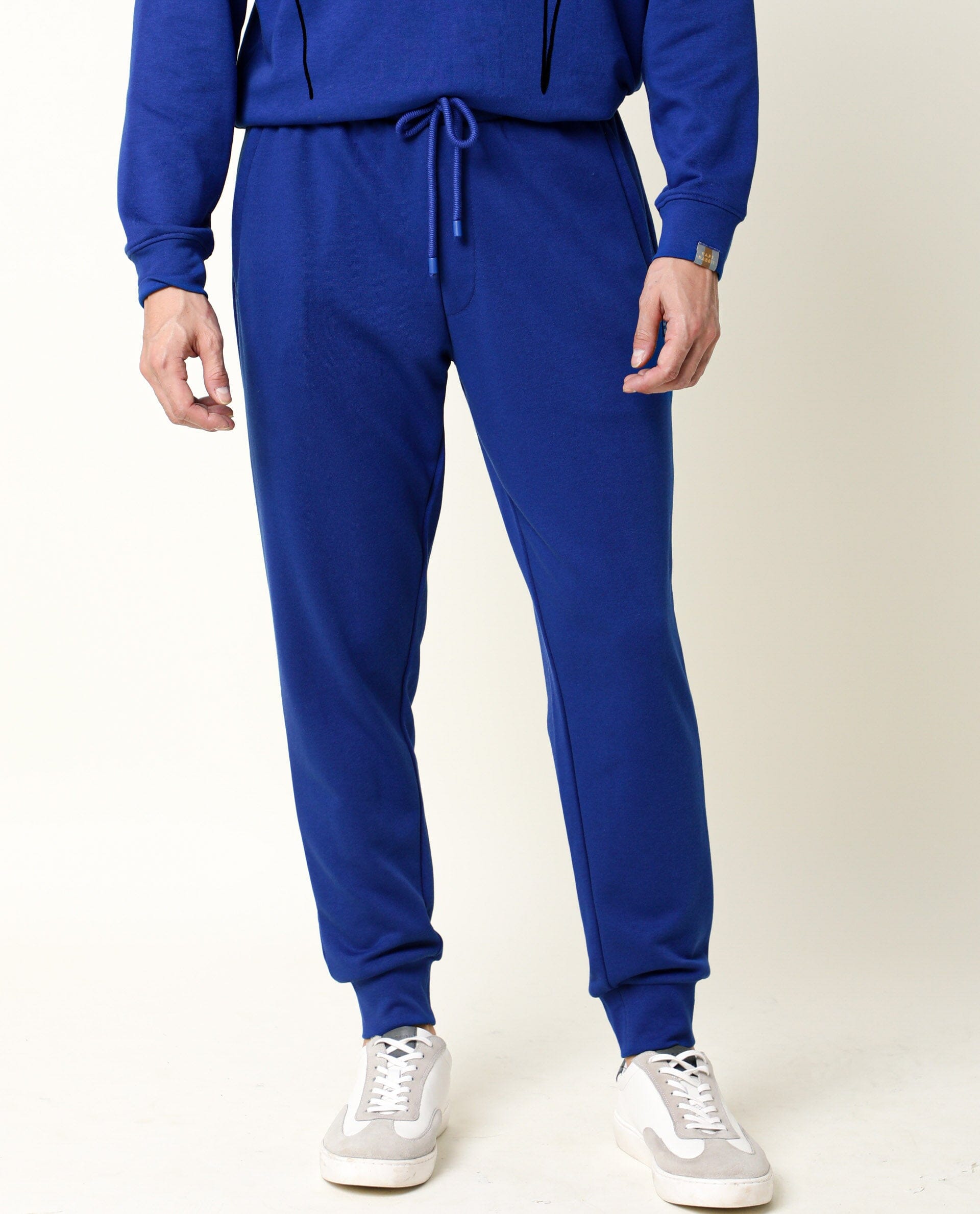 Rare Rabbit Men's Titan Fluorescent Blue Cotton Polyester Fabric Drawstring Slim Fit Track Pant