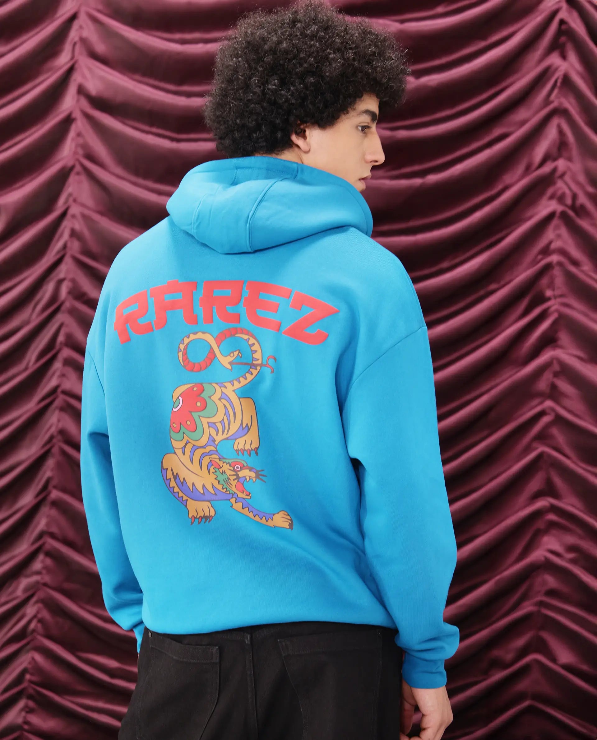Rare Rabbit Men Dary Flouroscent Blue Cotton Polyester Fabric Full Sleeve Crew Neck Boxy Fit Puff Print Hooded Sweatshirt