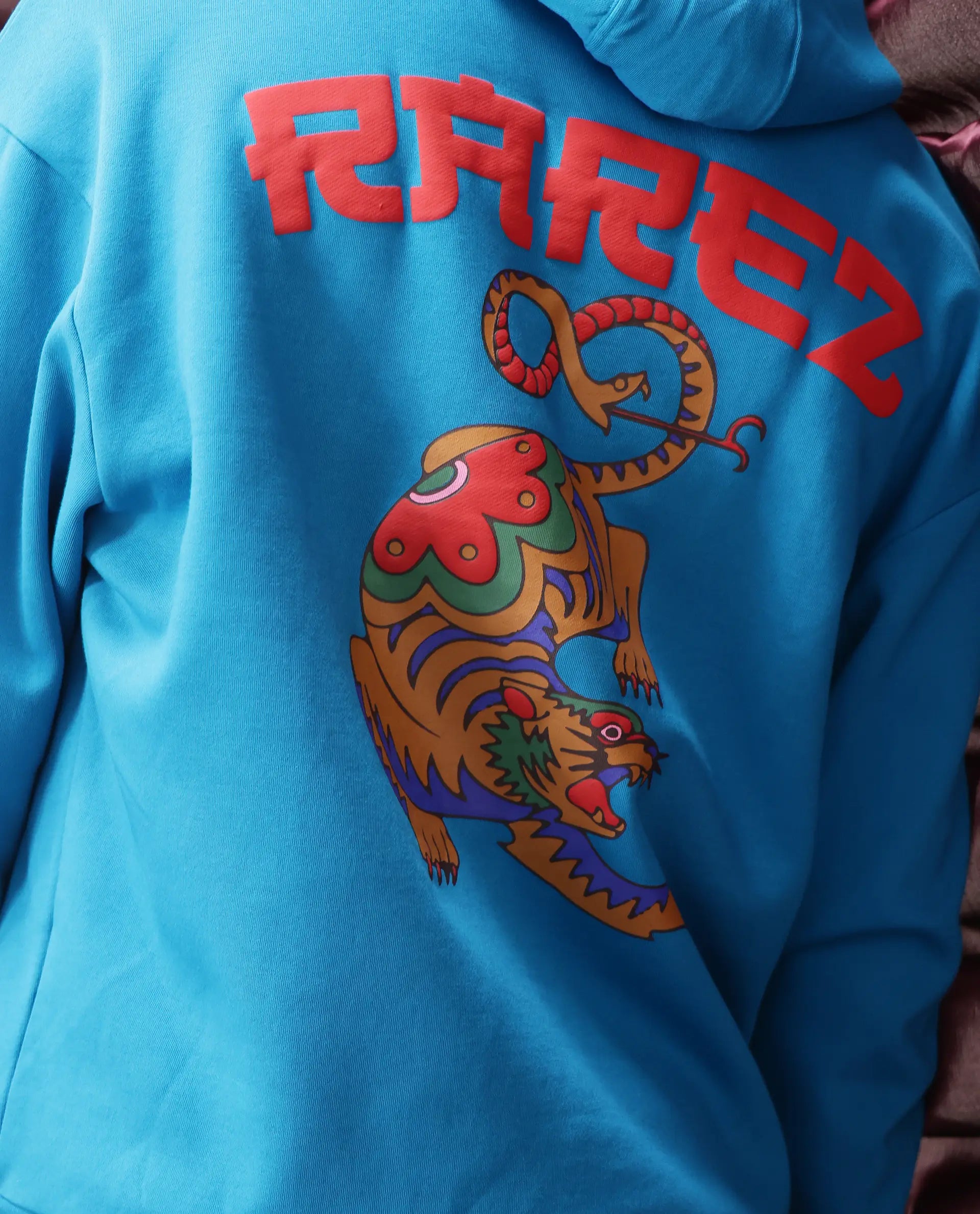 Rare Rabbit Men Dary Flouroscent Blue Cotton Polyester Fabric Full Sleeve Crew Neck Boxy Fit Puff Print Hooded Sweatshirt