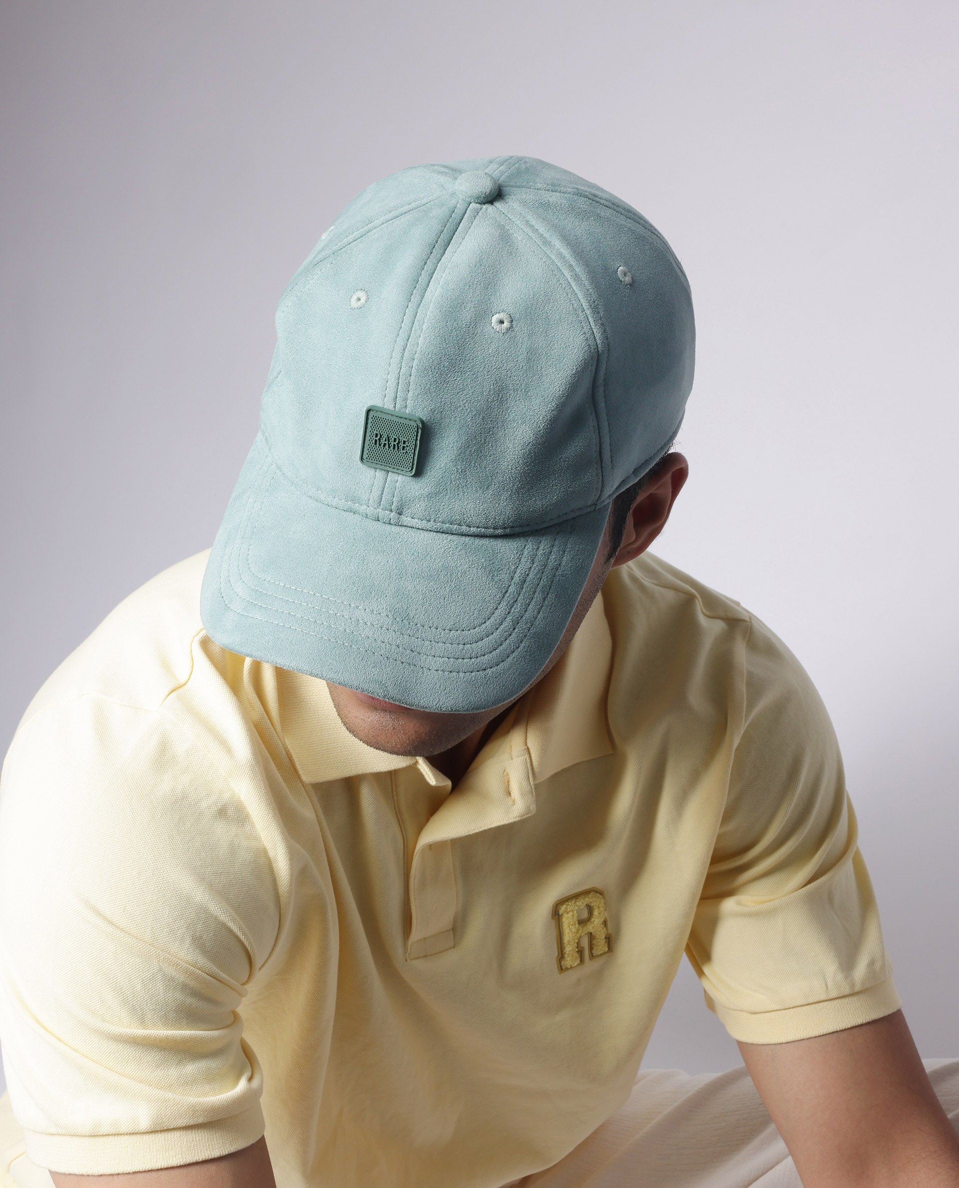 Rare Rabbit Men Armour Teal Suede Monotone Color Silicone Badge Branding Cap