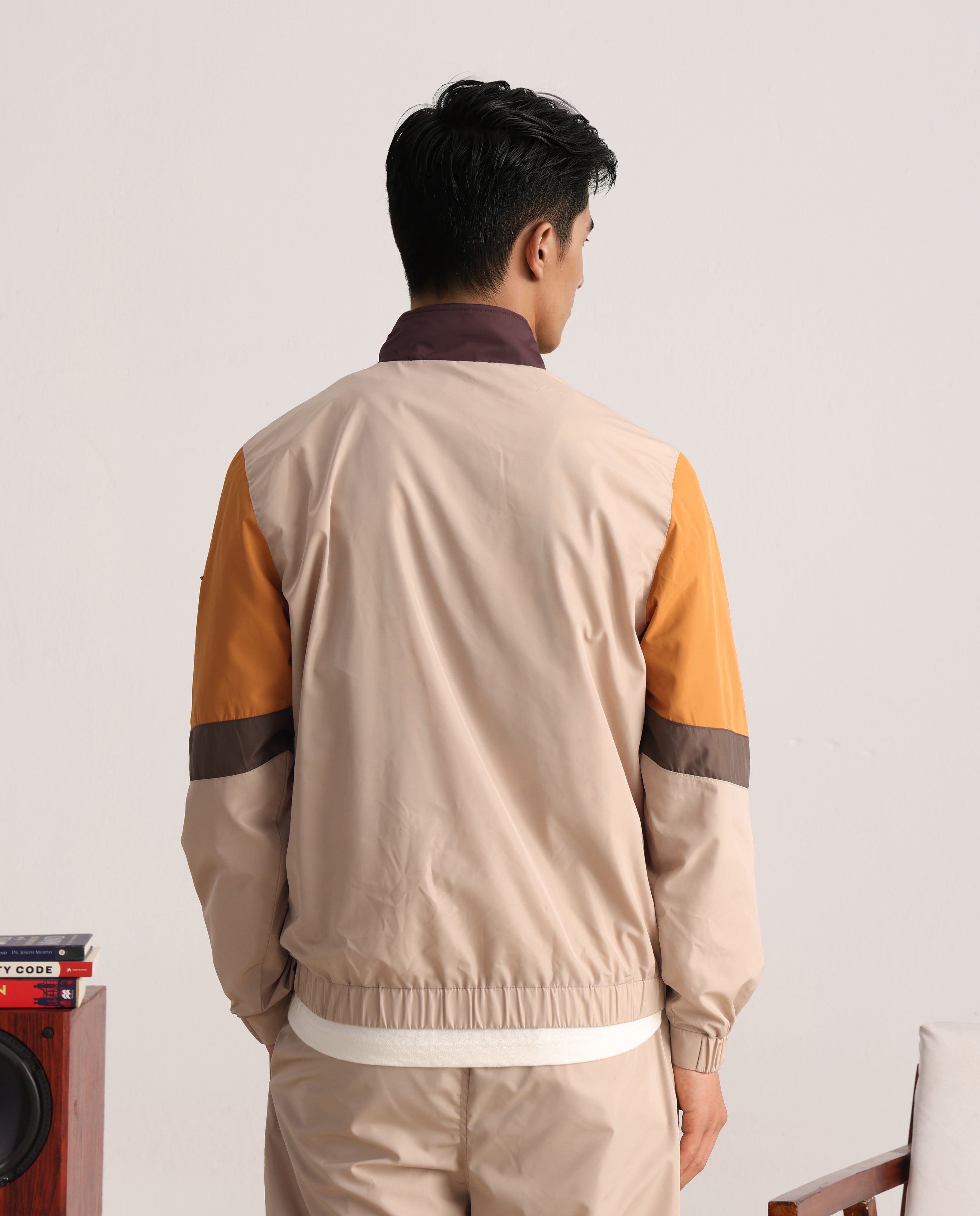 Rare Rabbit Men Malo Beige Polyester Fabric Full Sleeve High Neck Collar Zipper Closure Cut and Sew Jacket