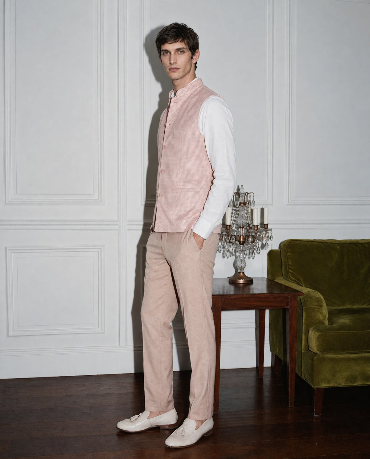 Rare Rabbit Men's Emerald Light Pink Polyester Plain Tailored Fit Sleeveless Mandarin Collar Bandhgala Rare Rabbit Men's Lasmos-B1 Beige Viscose Embroidered Regular Fit Sleeveless Mandarin Collar Bandhgala Nehru Jacket