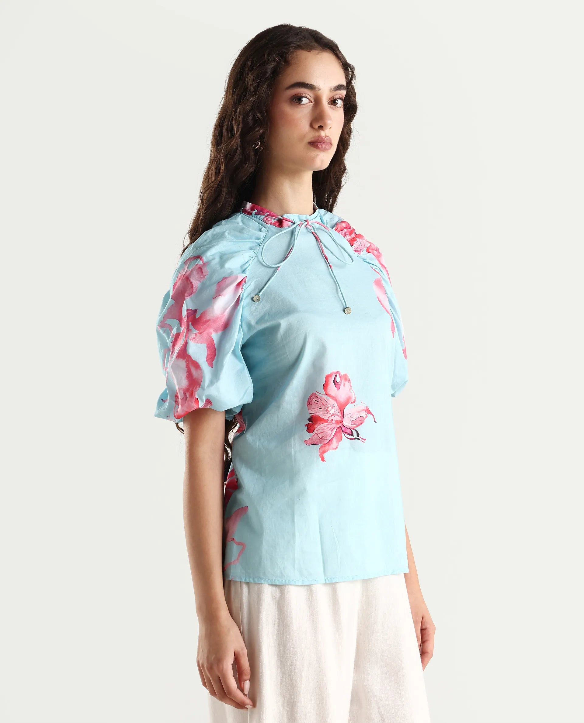 Rareism Women's Kink Blue Polyester Blend Tie-Up Neck Floral Print Puff Sleeves Relaxed Fit Top