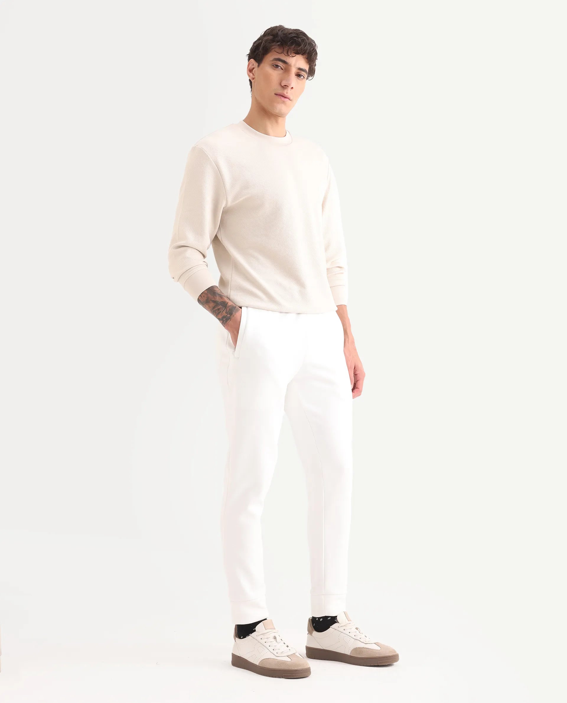 Rare Rabbit Mens Trant Off White Joggers Mid Rise Solid
