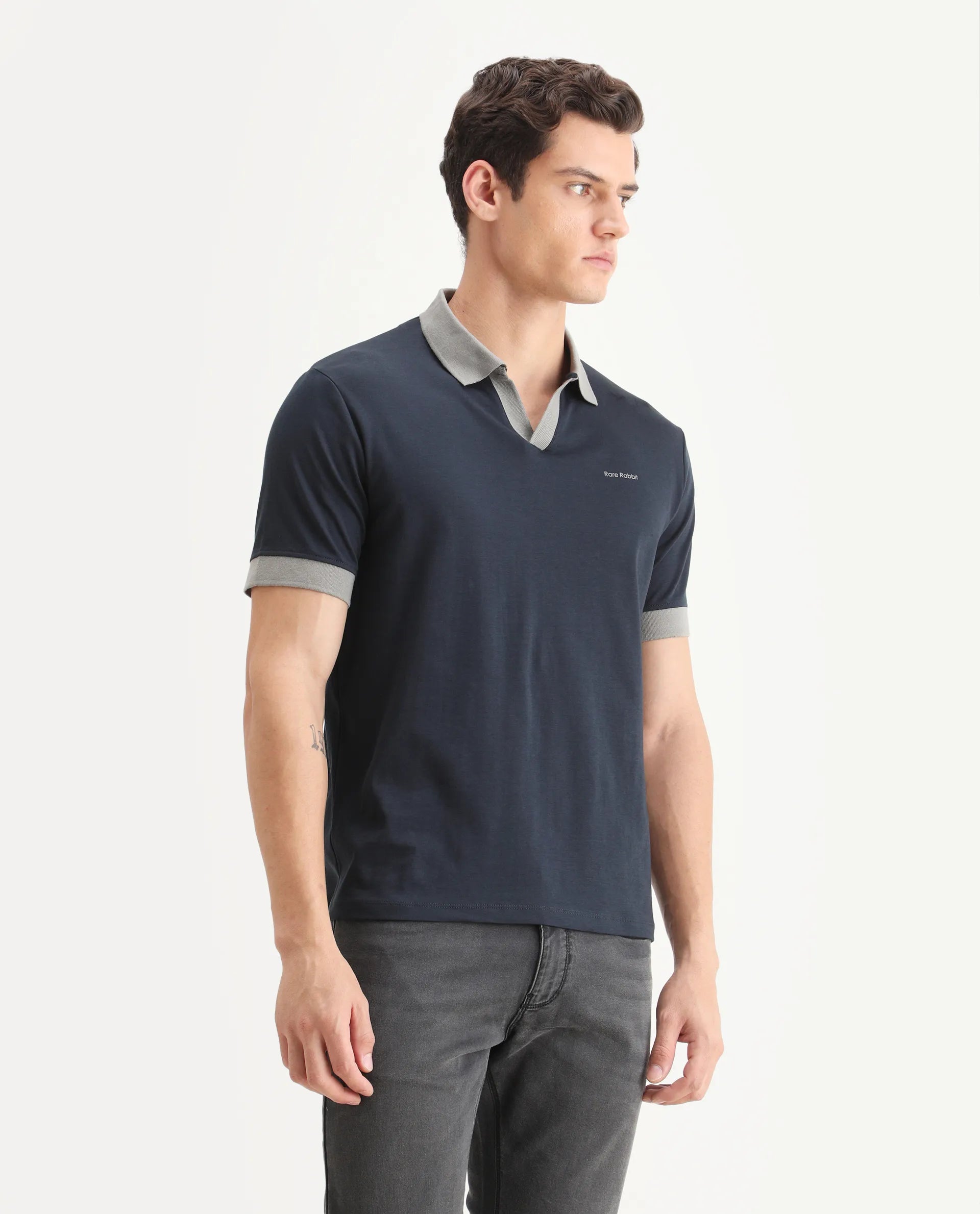 Rare Rabbit Men's Carmelon Navy Cotton Plain Regular Fit Half Sleeve Polo