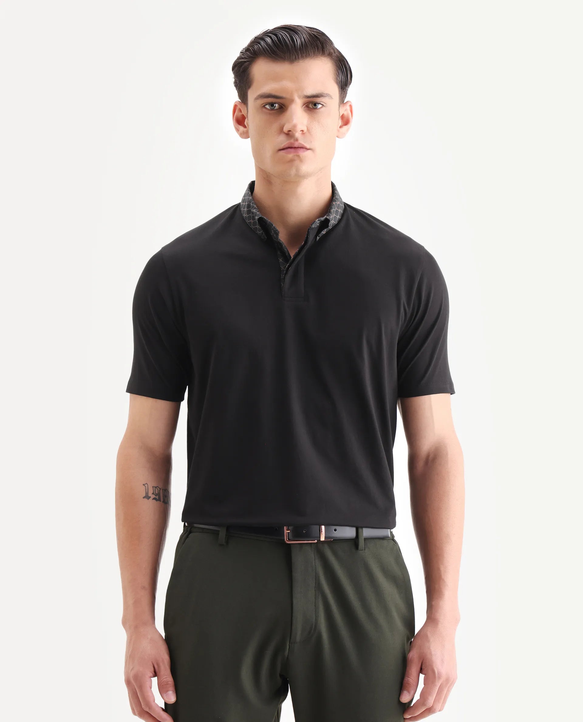 Rare Rabbit Men's Rinz Black Cotton Blend Plain Regular Fit Half Sleeve Polo