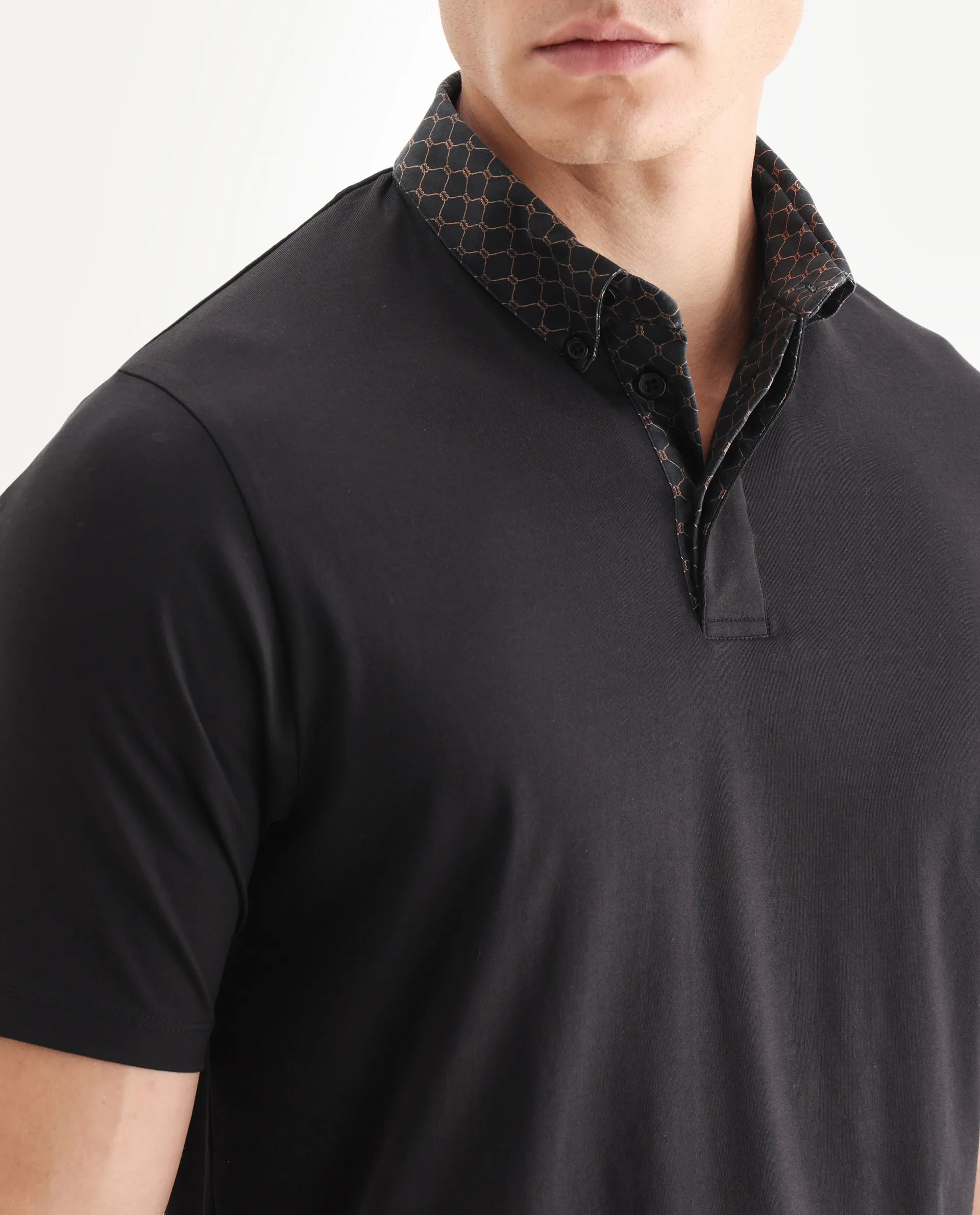 Rare Rabbit Men's Rinz Black Cotton Blend Plain Regular Fit Half Sleeve Polo