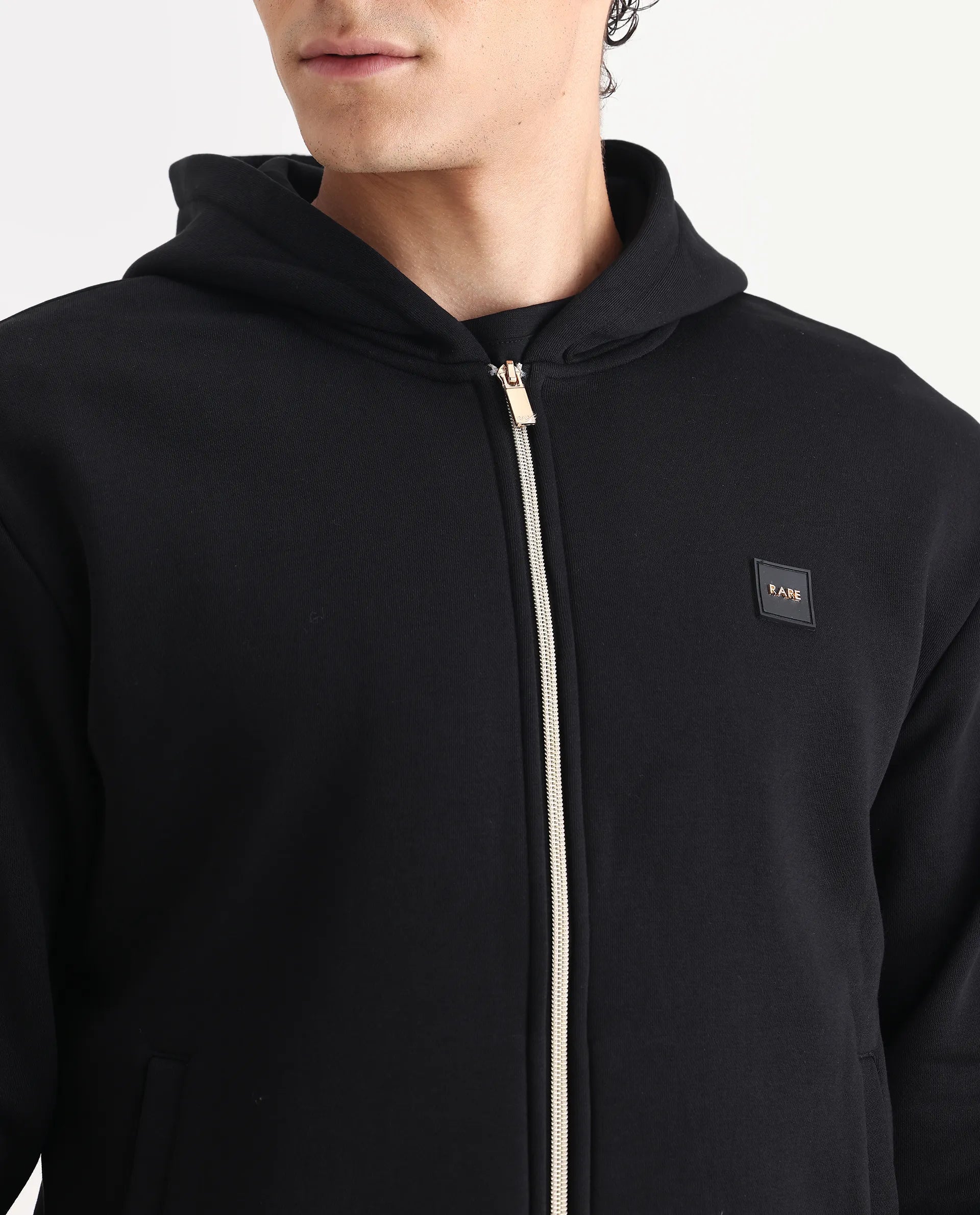 Rare Rabbit Men's Anderson-T25 Black Cotton Blend Plain Relaxed Fit Full Sleeve Hooded Sweatshirt