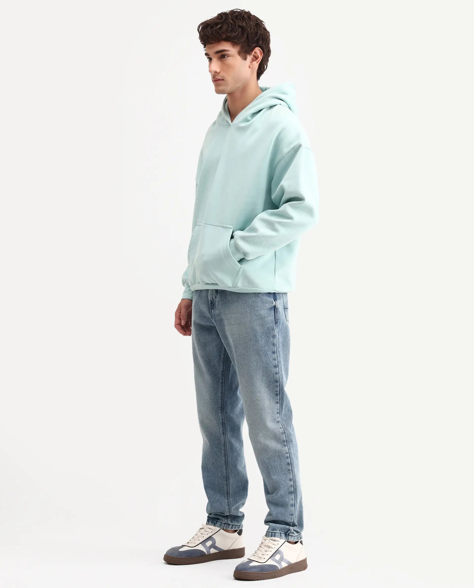 Rare Rabbit Men's Rokk Light Blue Cotton Blend Fabric Shank And Zipper Kurt Carrot Plain Jeans
