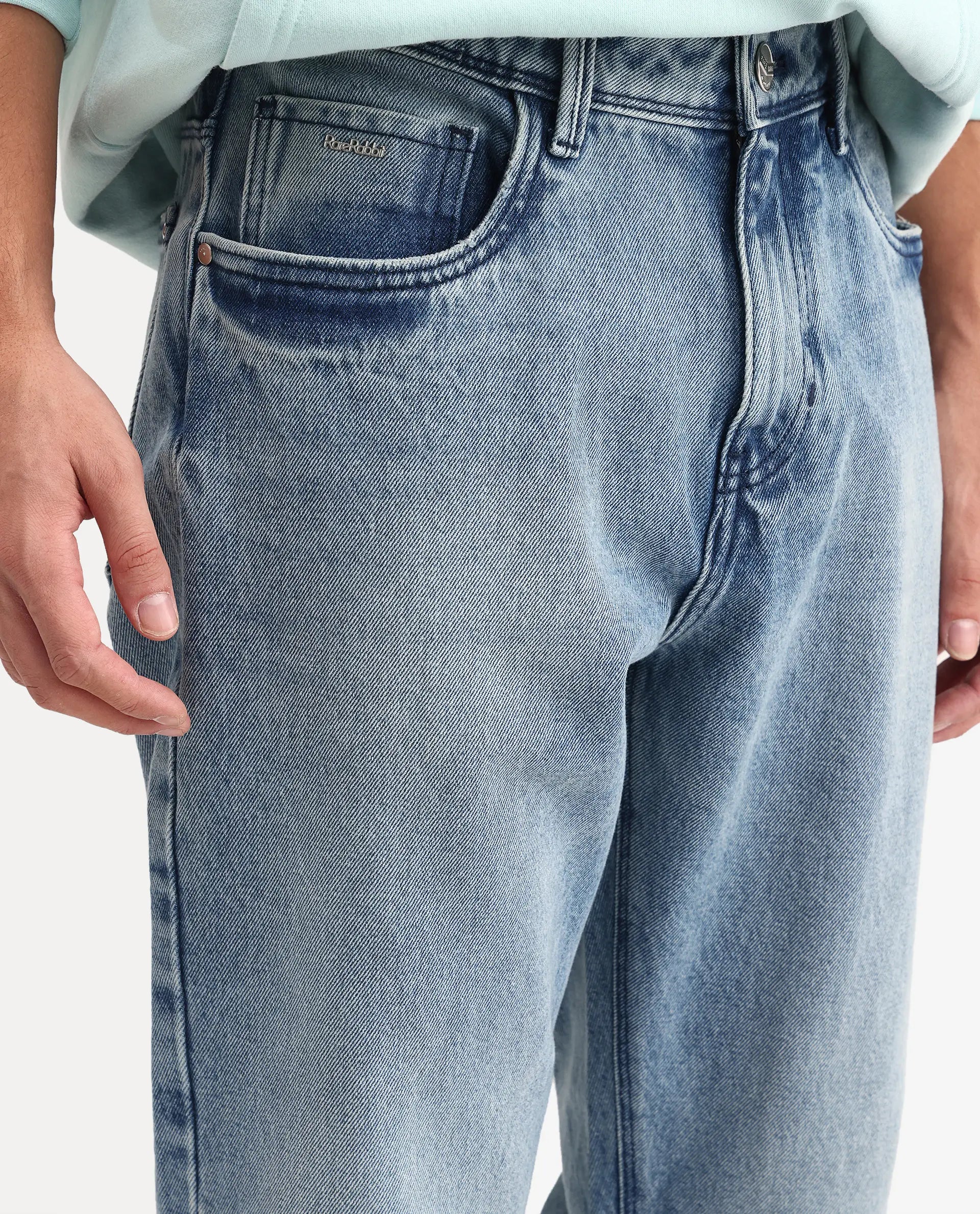 Rare Rabbit Men's Rokk Light Blue Cotton Blend Fabric Shank And Zipper Kurt Carrot Plain Jeans