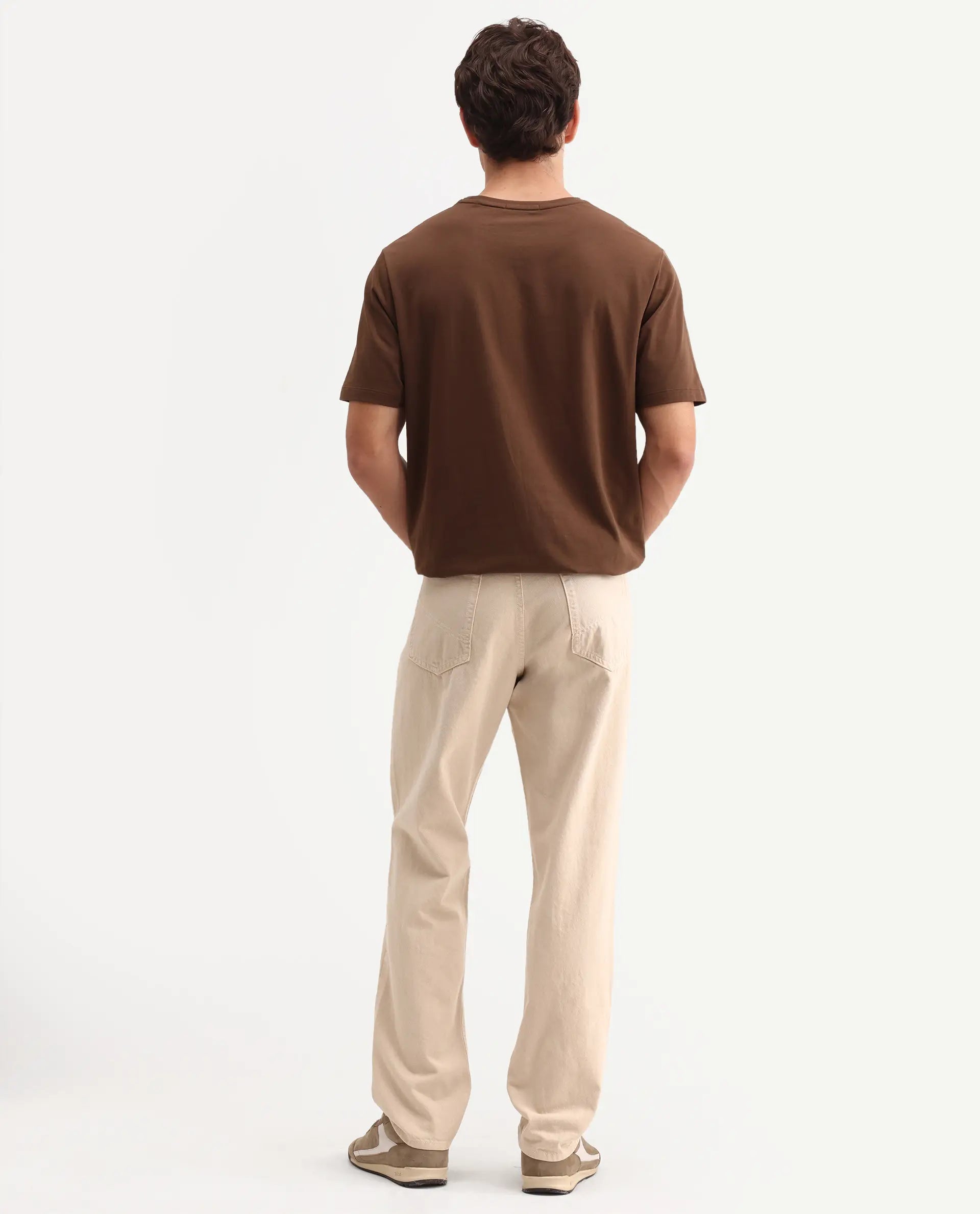 Rare Rabbit Men's Arvin Light Beige Cotton Fabric Shank And Zipper Kurt Carrot Plain Jeans