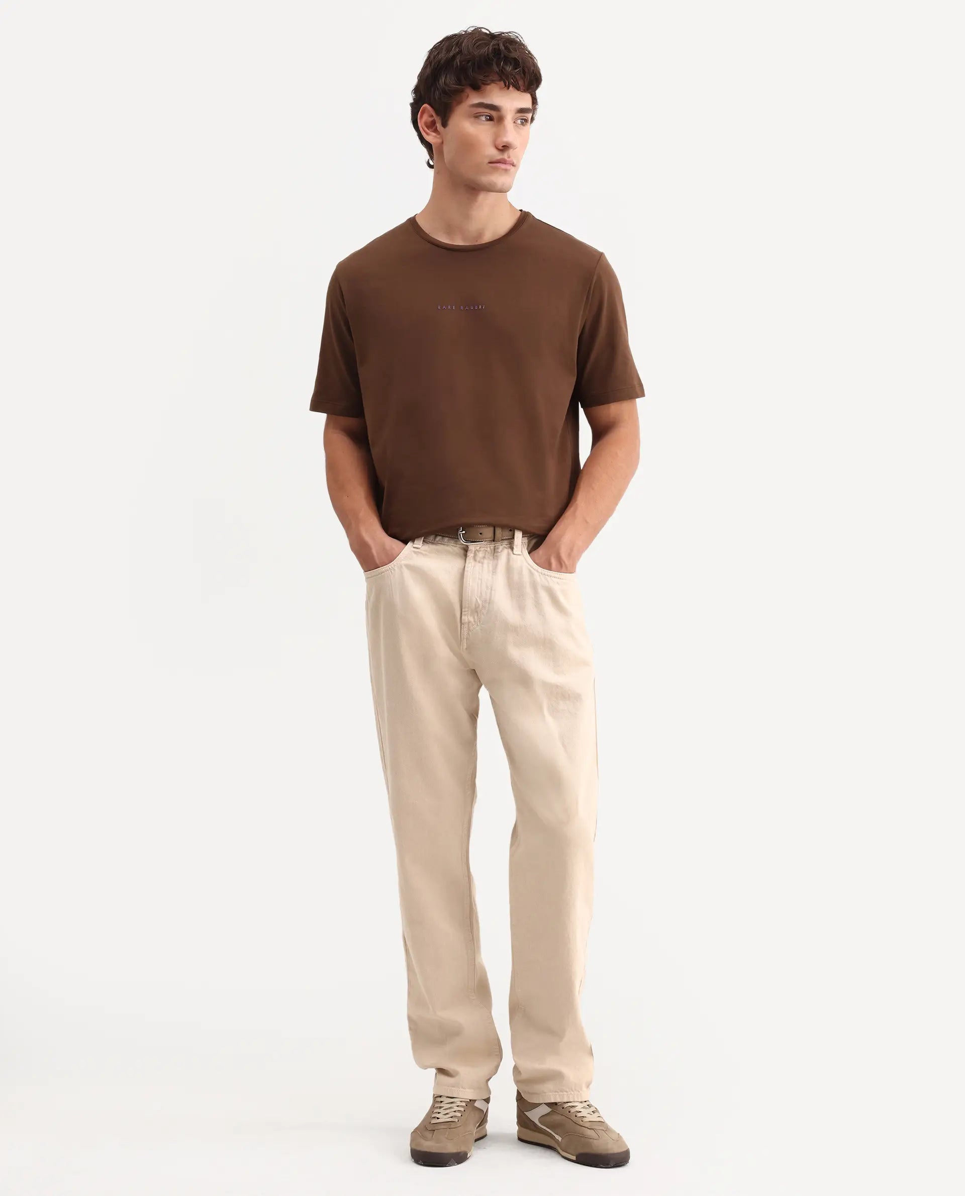 Rare Rabbit Men's Arvin Light Beige Cotton Fabric Shank And Zipper Kurt Carrot Plain Jeans