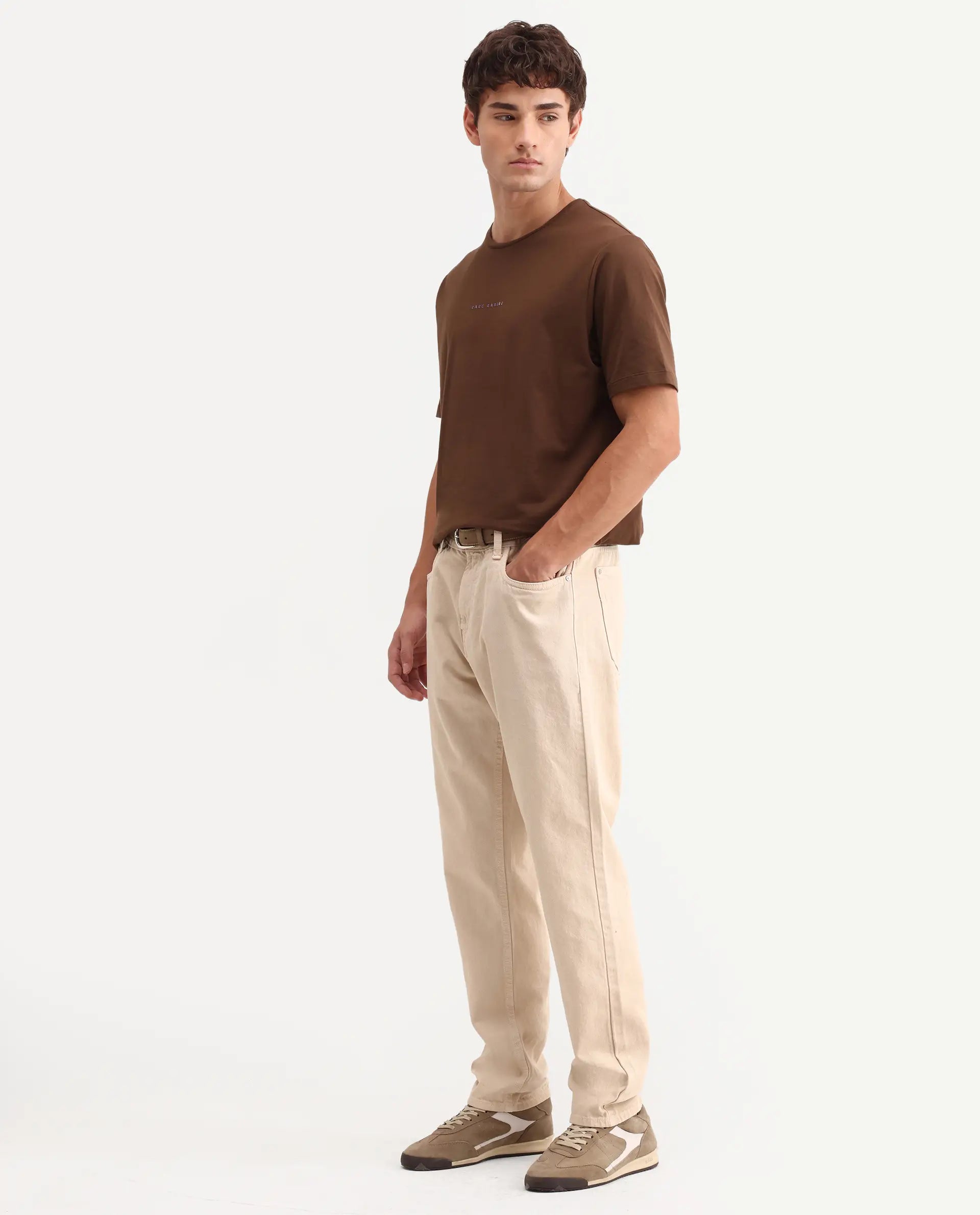 Rare Rabbit Men's Arvin Light Beige Cotton Fabric Shank And Zipper Kurt Carrot Plain Jeans