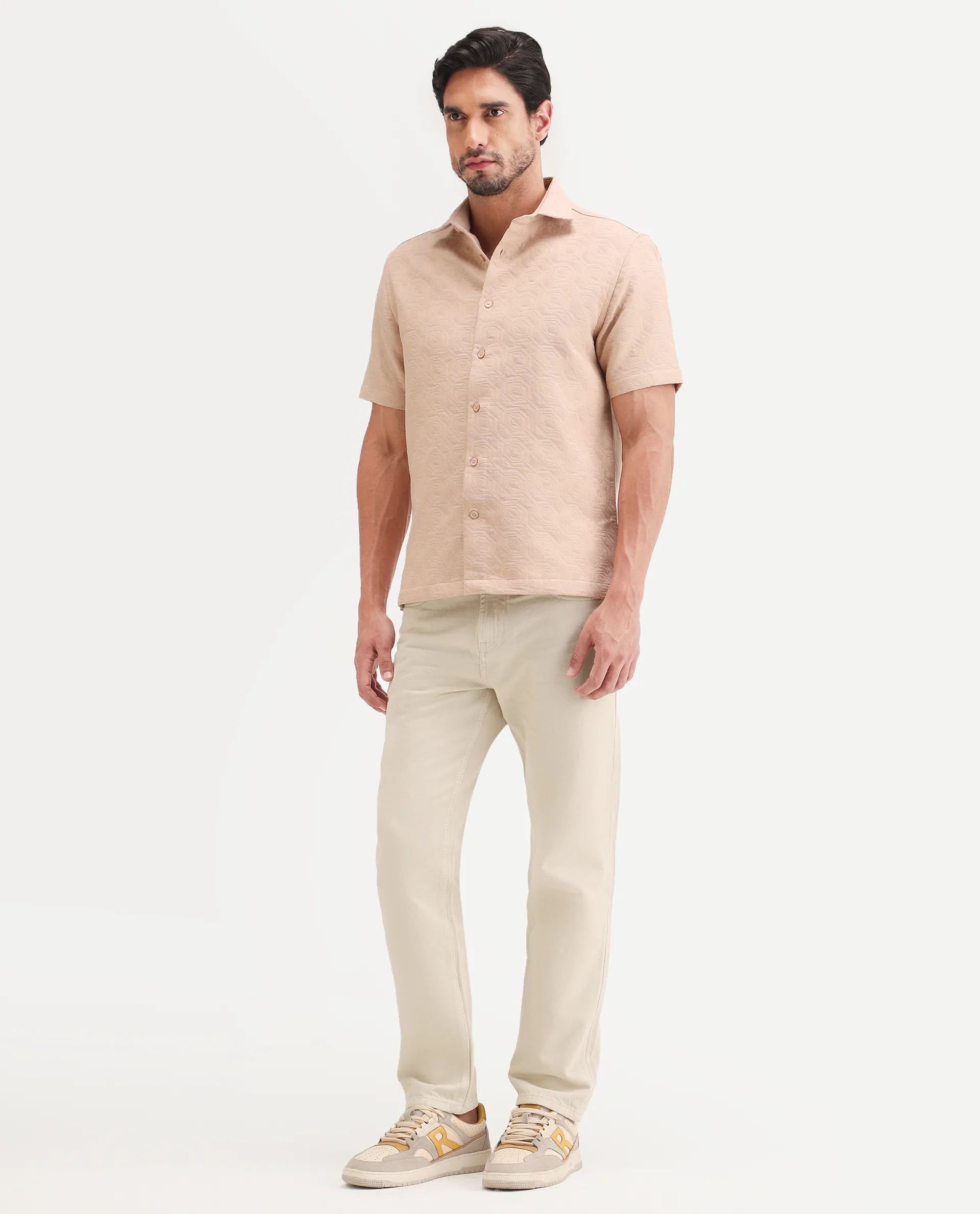 Rare Rabbit Men's Arvi B Beige Cotton Fabric Shank And Zipper Kurt Carrot Plain Jeans