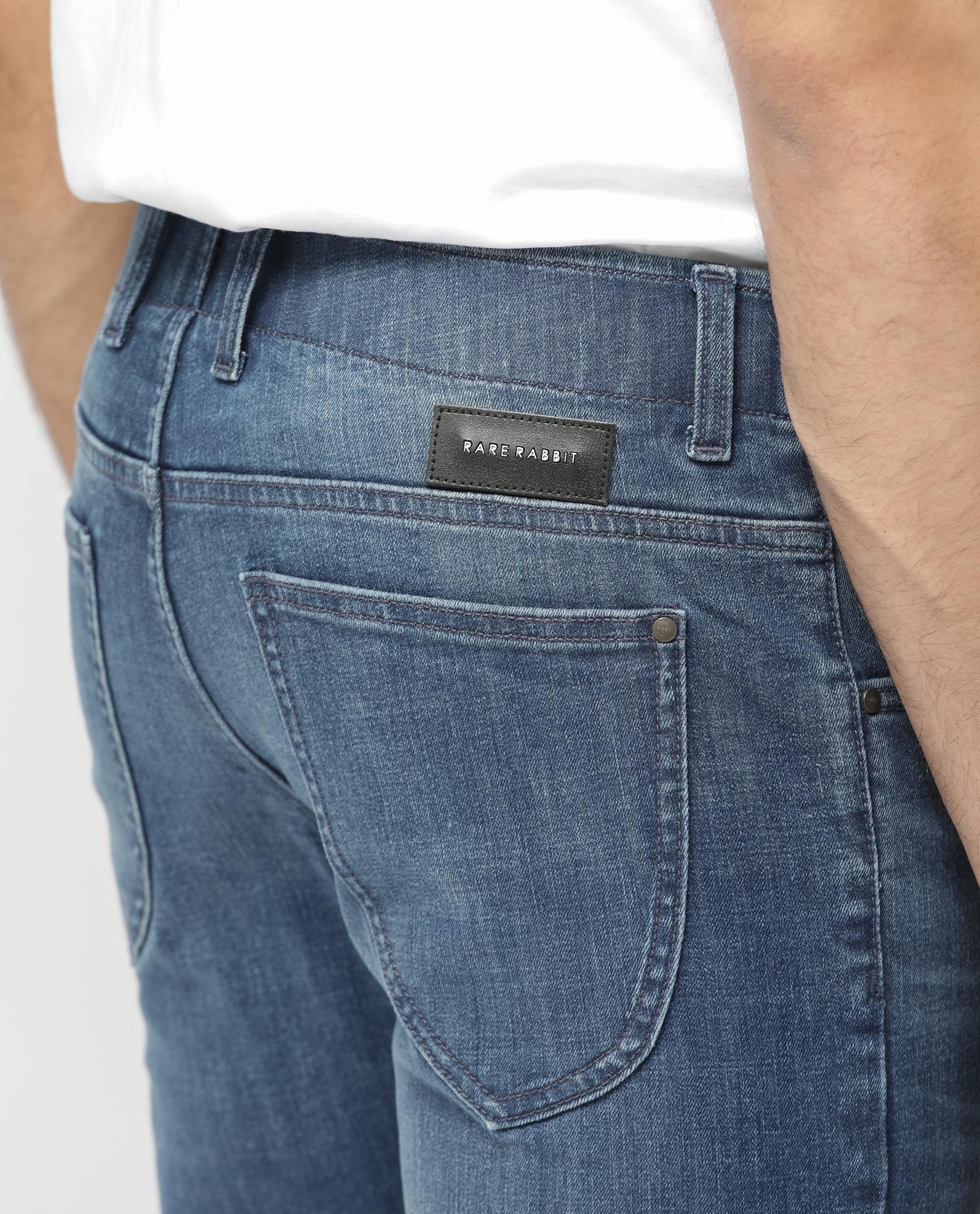 Rare Rabbit Mens Alec Blue Mid Wash Cotton Polyester Solid Skinny Fit Jeans