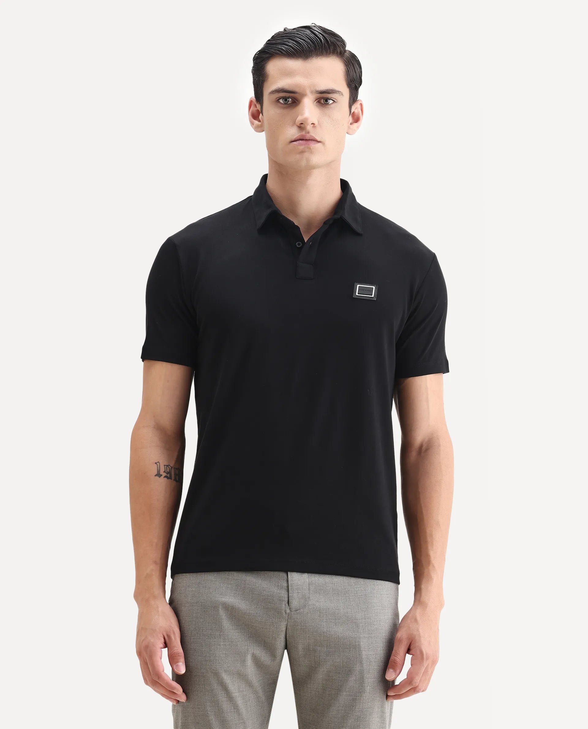 Rare Rabbit Men's Badger-1 Black Cotton Plain Regular Fit Half Sleeve Polo