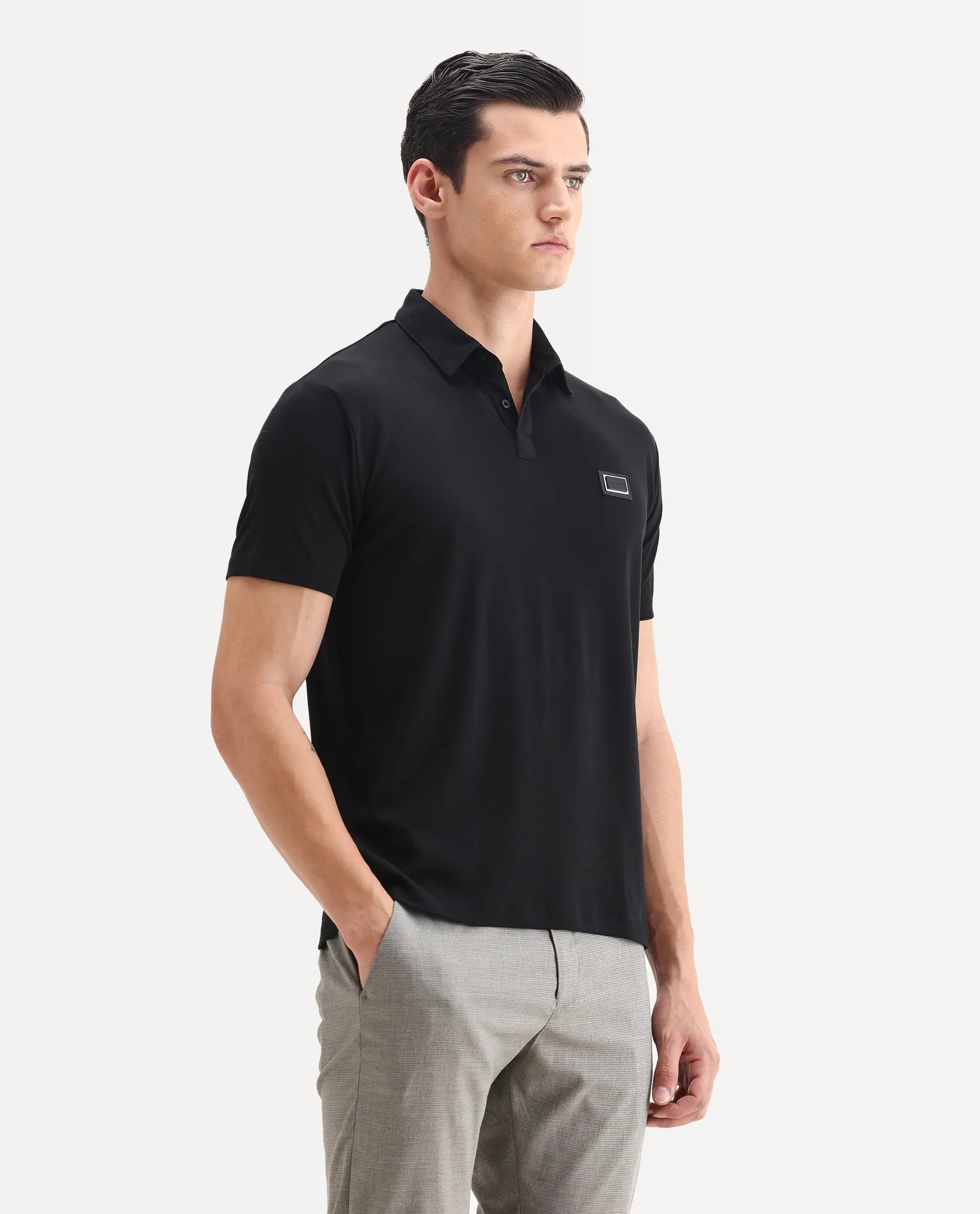 Rare Rabbit Men's Badger-1 Black Cotton Plain Regular Fit Half Sleeve Polo