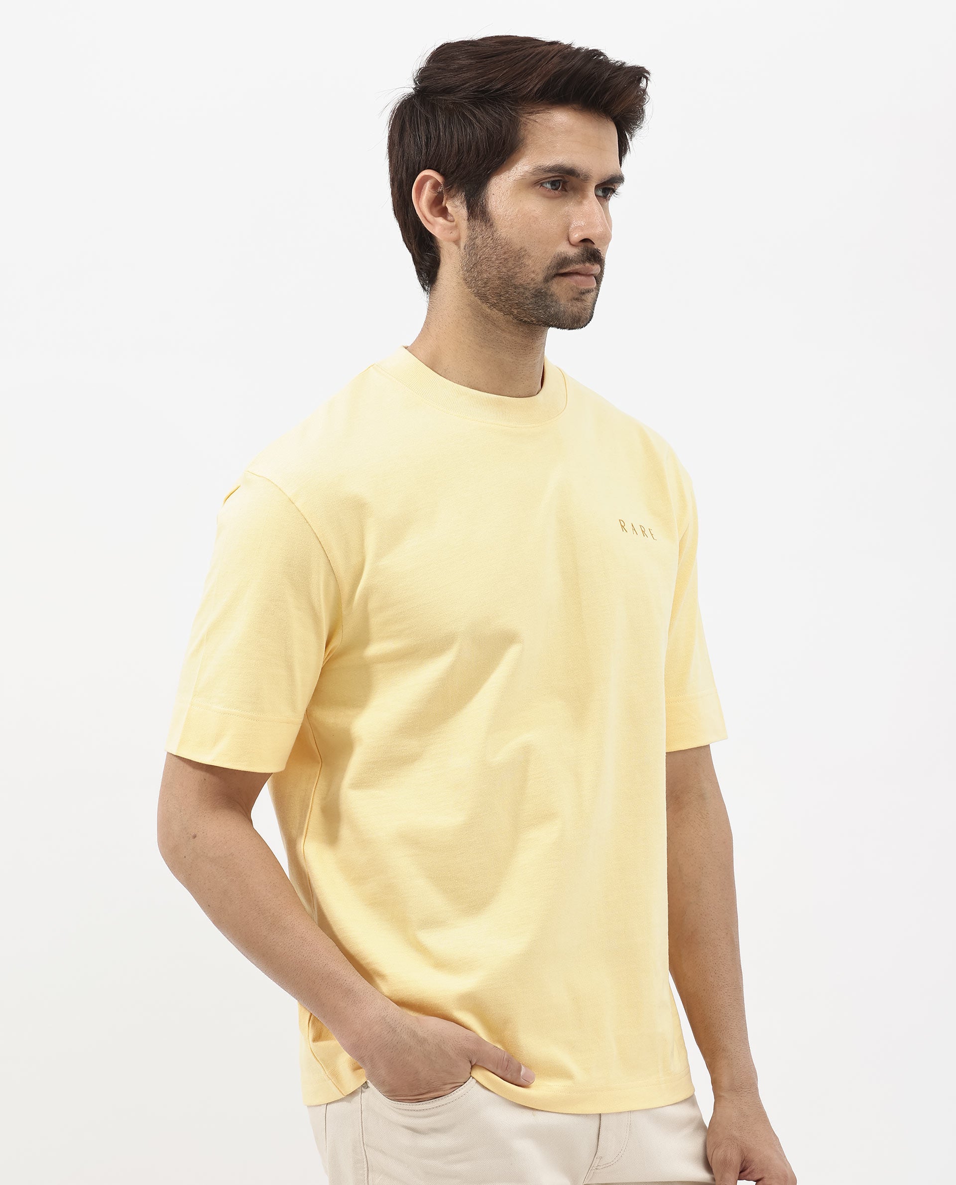 Rare Rabbit Articale Mens Beck Dusky Yellow Cotton Fabric Short Sleeve Crew Neck Oversized Fit Graphic Printed T-Shirt