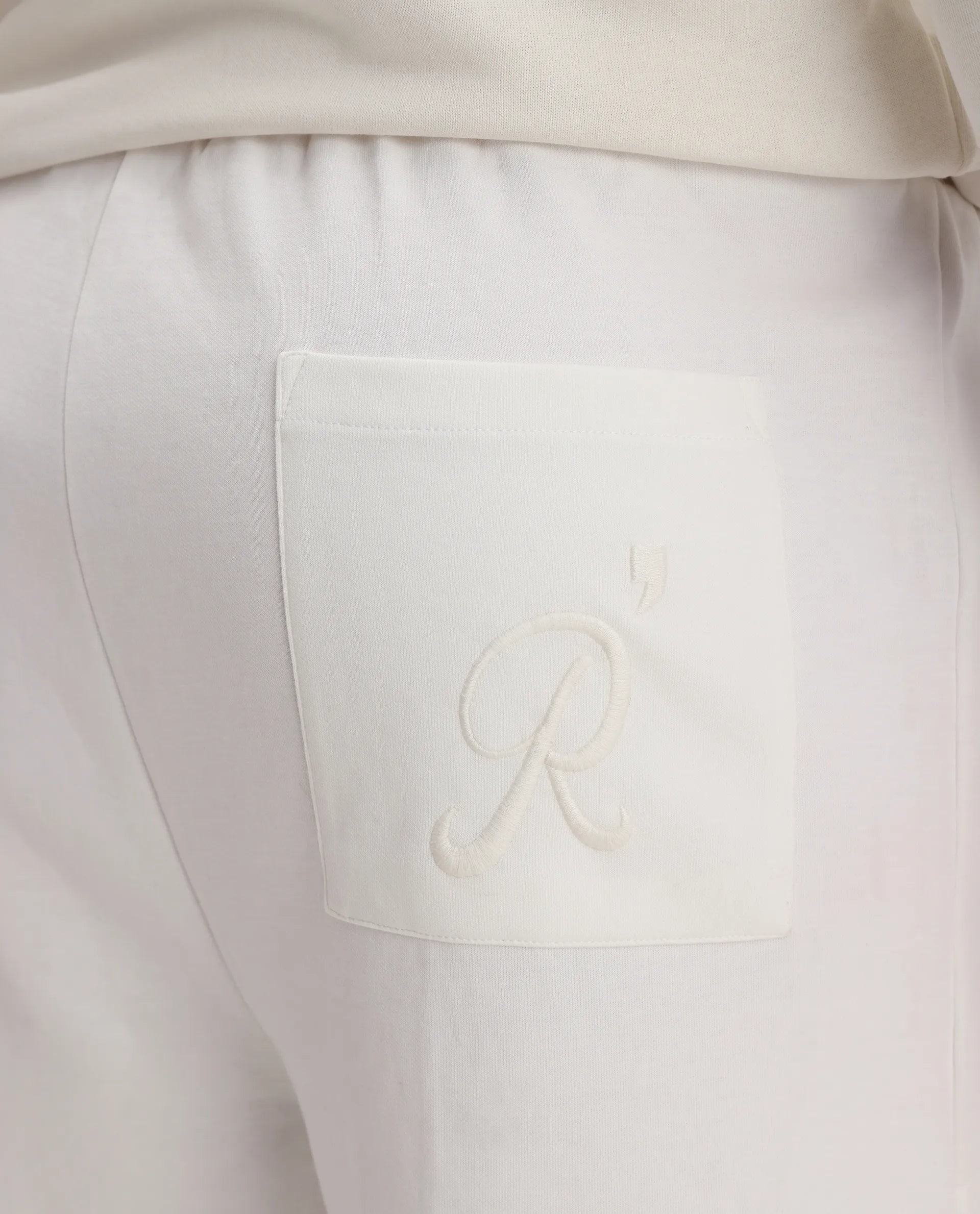 Rare Rabbit Men's Breckin Off White Cotton Blend Embroidered Relaxed Fit Track Pant