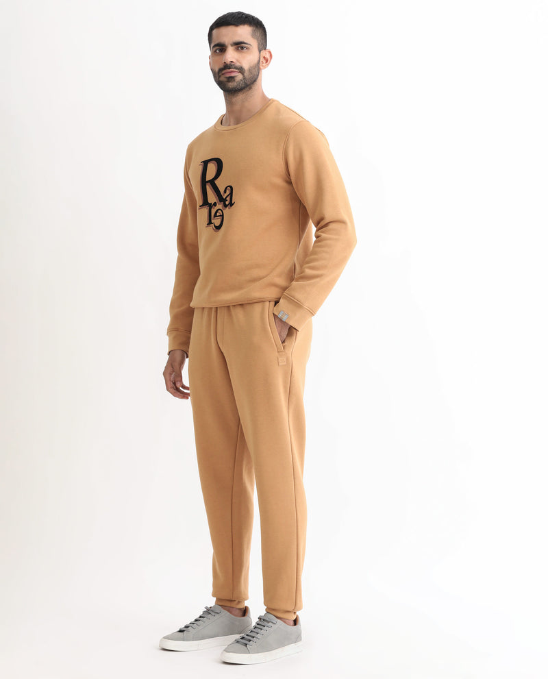 RARE RABBIT MENS BRIGHTON MUSTARD TRACK PANT COTTON POLYESTER FABRIC MID RISE KNITTED DRAW STRING CLOSURE REGULAR FIT