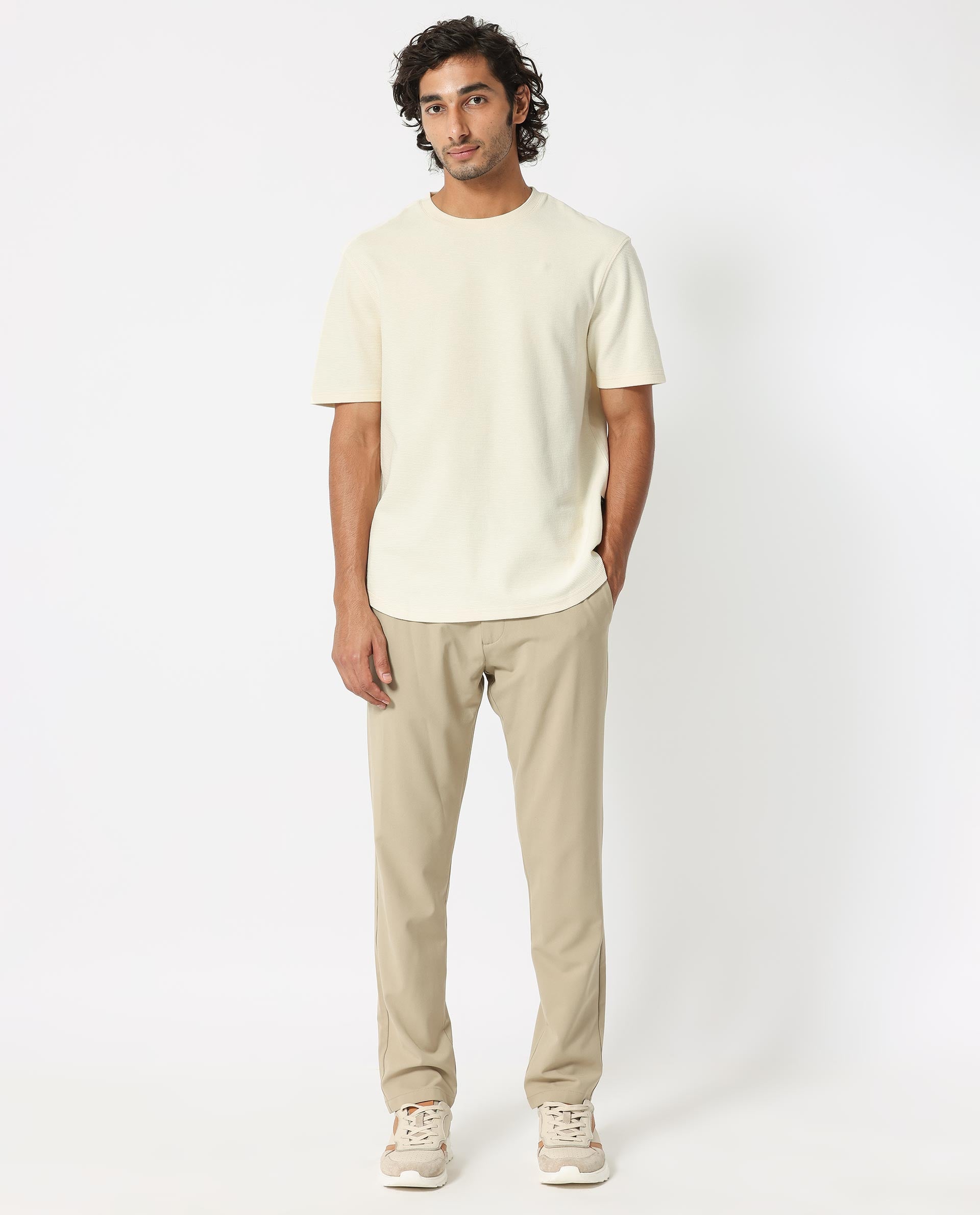 Rare Rabbit Men's Buenos Beige Solid Crew Neck Drop Shoulder Half Sleeves T-Shirt