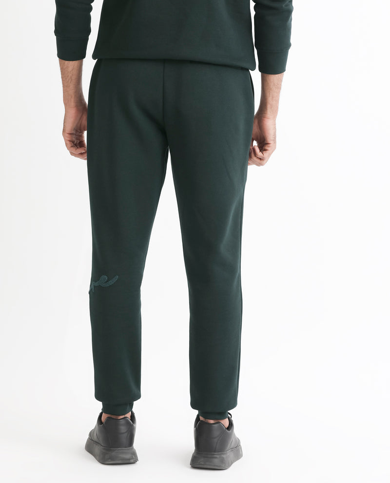 RARE RABBIT MENS CALLAN DARK GREEN TRACK PANT COTTON POLYESTER FABRIC MID RISE KNITTED DRAW STRING CLOSURE REGULAR FIT