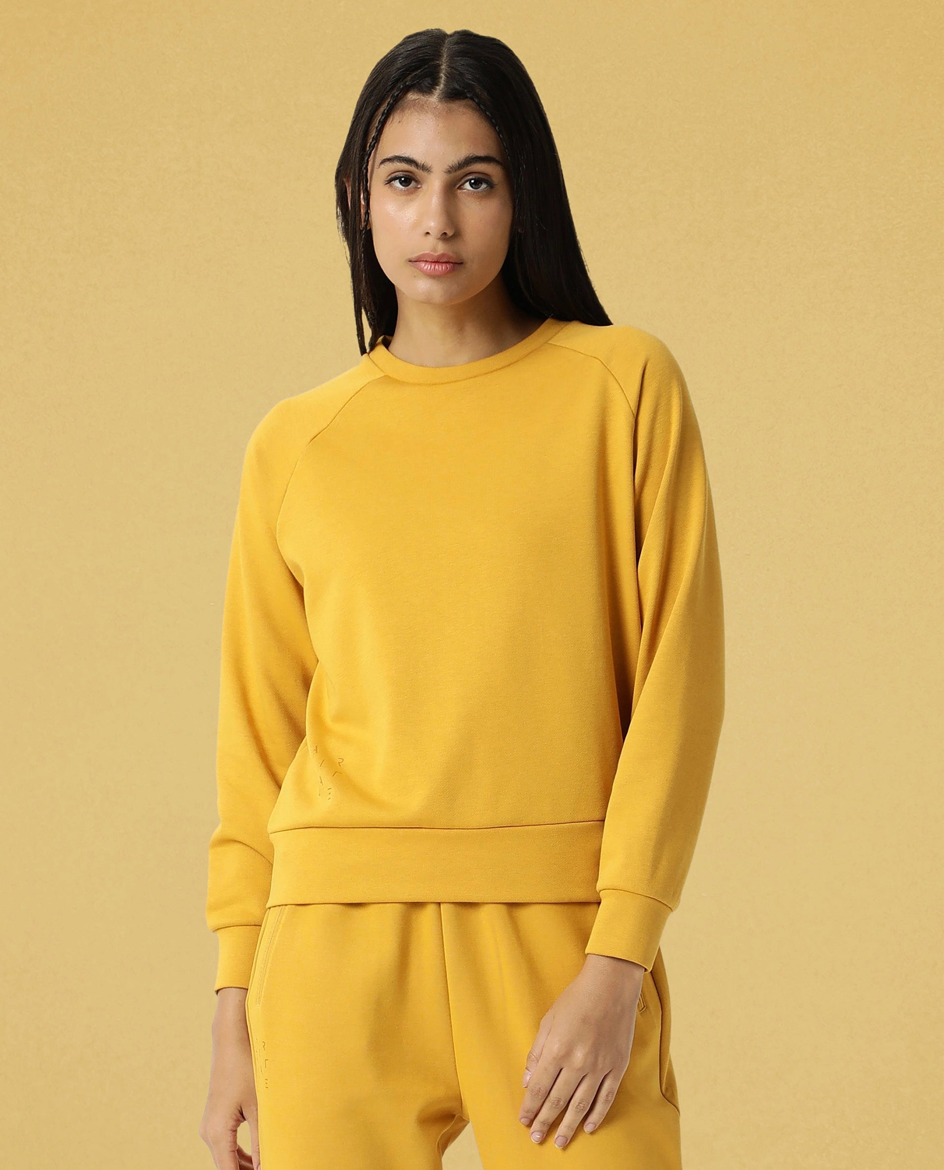 Rareism Women Cax Mustard Cotton Blend Fabric Relaxed Fit Full Sleeves Solid Round Neck Sweatshirt