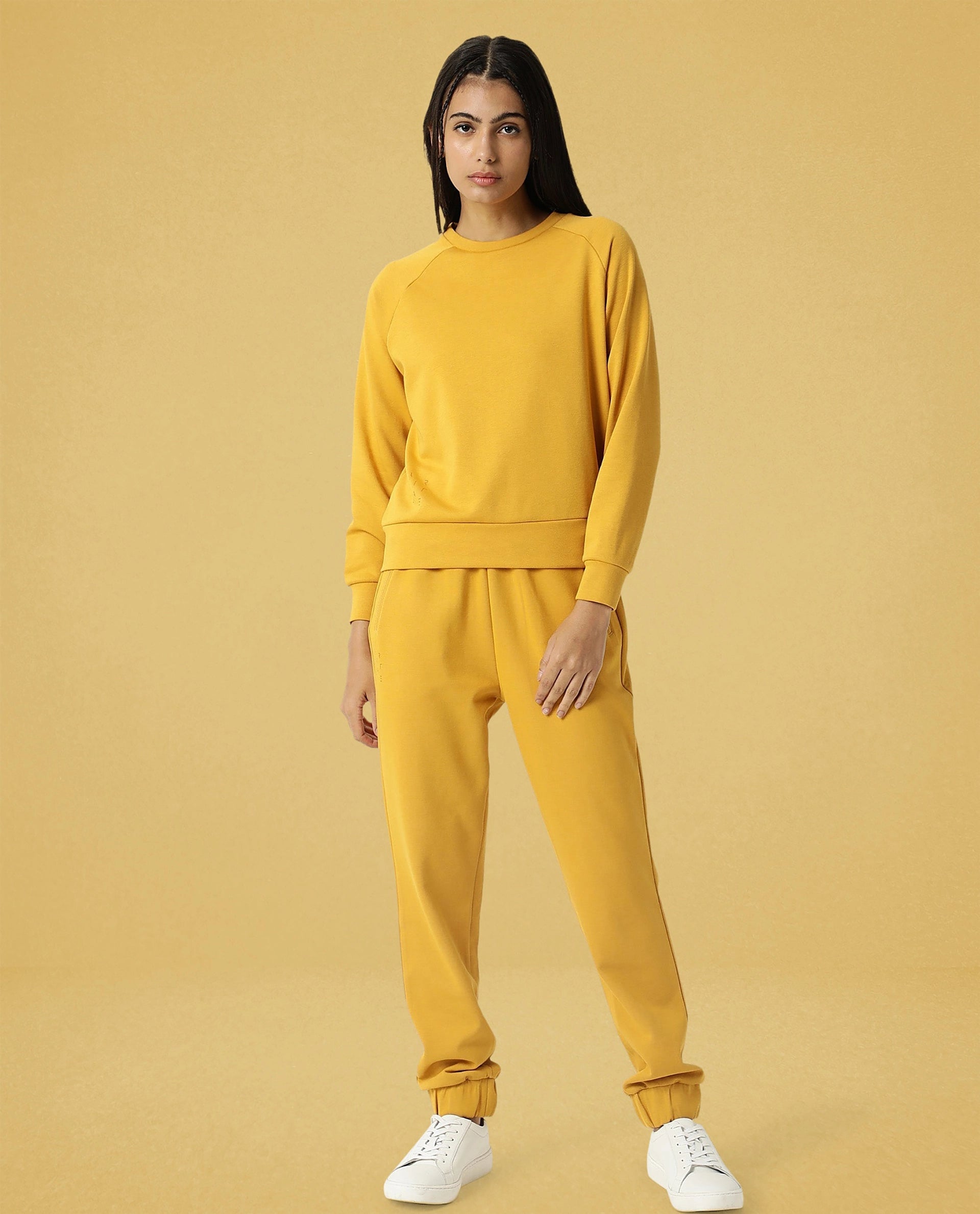 Rareism Women Cax Mustard Cotton Blend Fabric Relaxed Fit Full Sleeves Solid Round Neck Sweatshirt