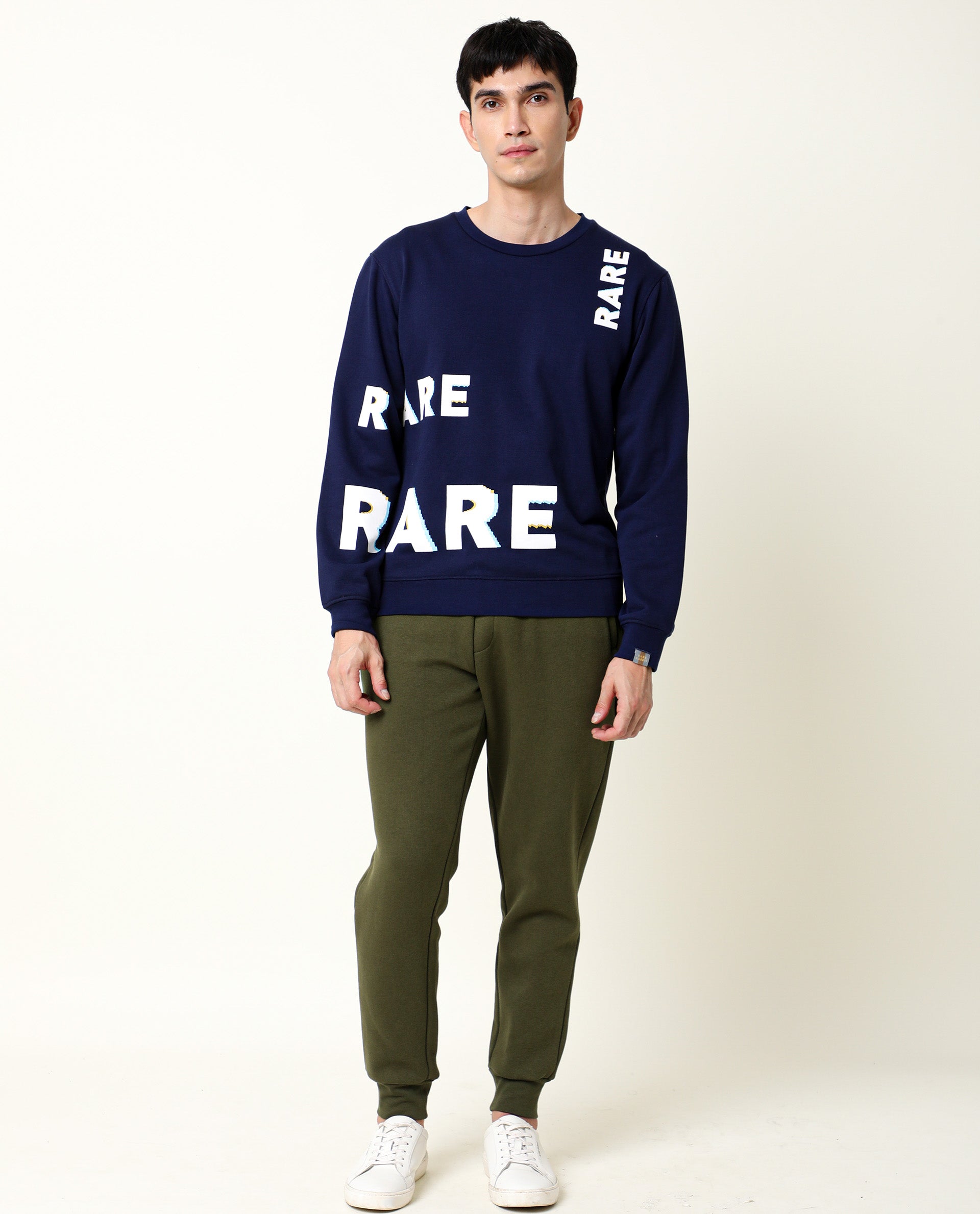 Rare Rabbit Men's Titan Light Green Cotton Polyester Fabric Relaxed Fit Mid Rise Knitted Track Pant