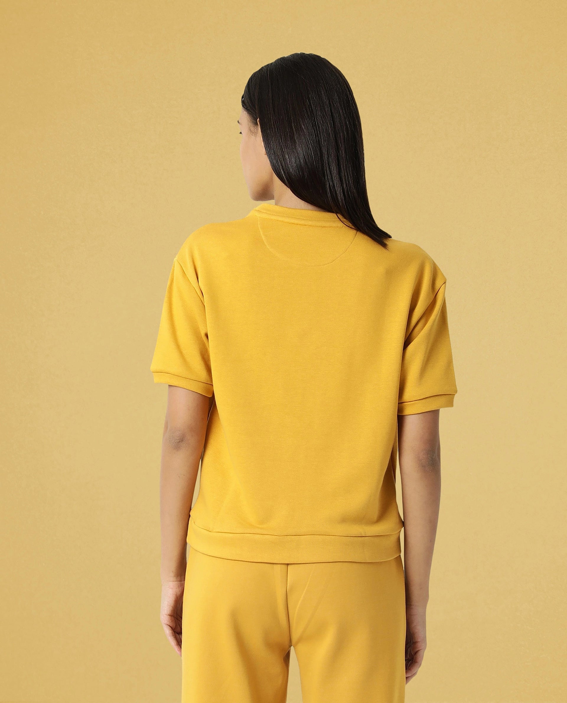 Rareism Women Coco Mustard Cotton Fabric Half Sleeves Relaxed Fit Solid Round Neck Sweat Tee