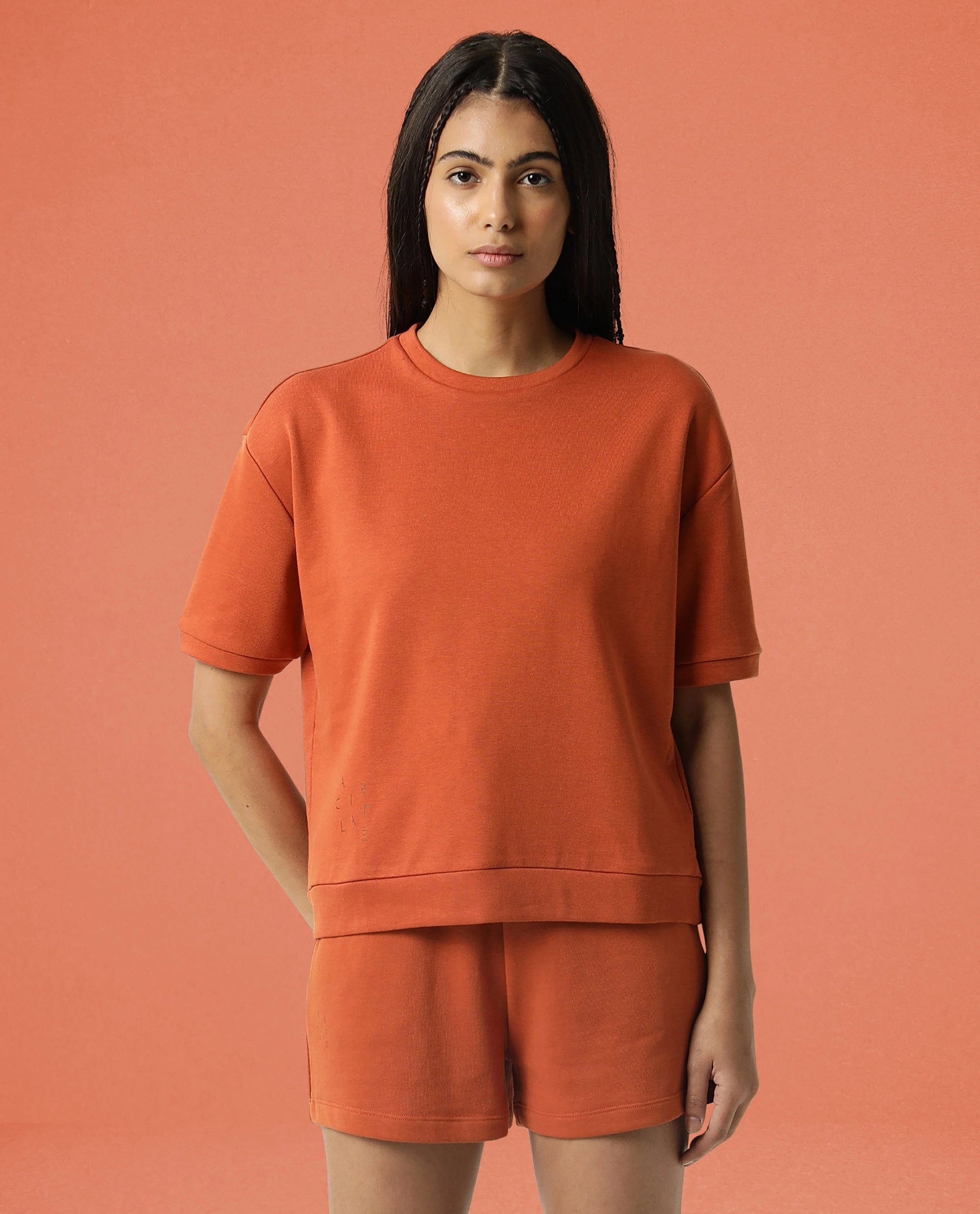 Rareism Women Coco Orange Cotton Fabric Half Sleeves Relaxed Fit Solid Round Neck Sweat Tee