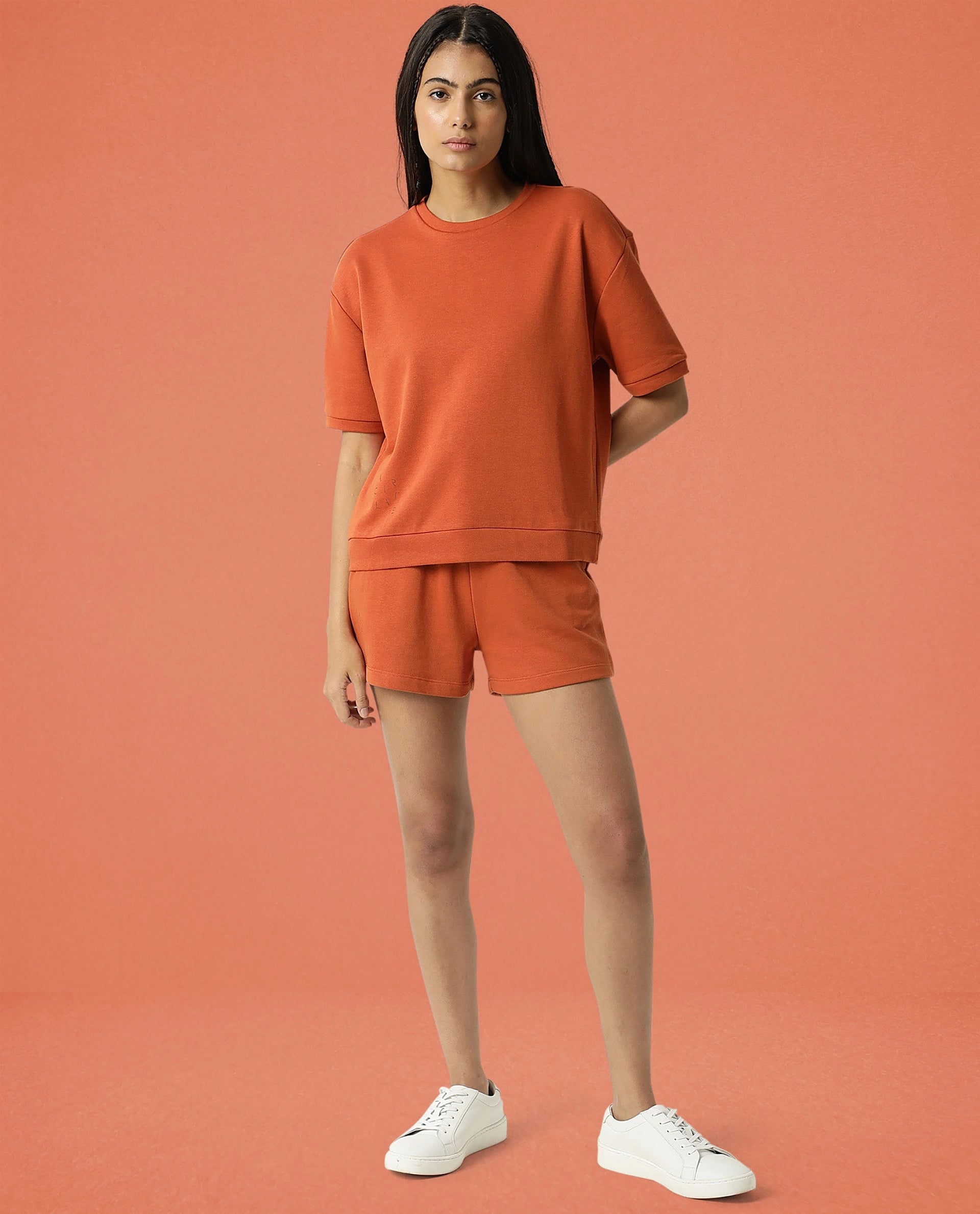 Rareism Women Coco Orange Cotton Fabric Half Sleeves Relaxed Fit Solid Round Neck Sweat Tee