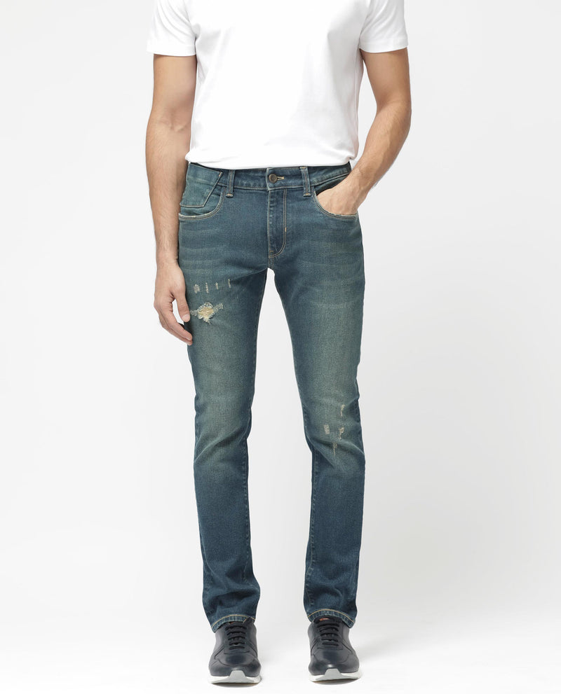 SLIM FIT MID WASH TINTED JEANS