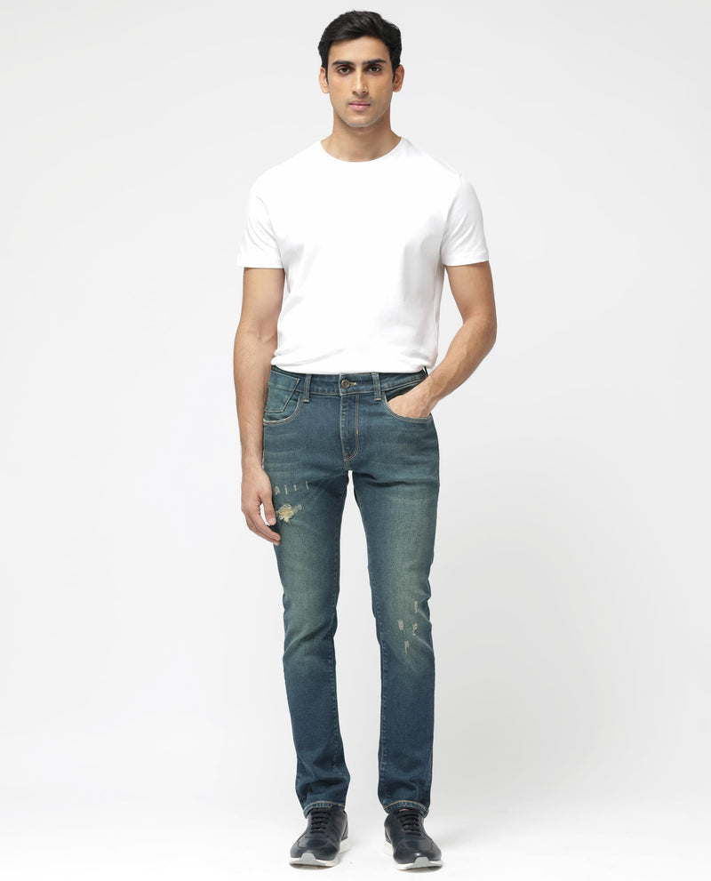 Rare Rabbit Men's Coro Pastel Blue Cotton Polyester Slim Fit Mid Rise Mid Wash With Mild Whiskers And Distress Jeans