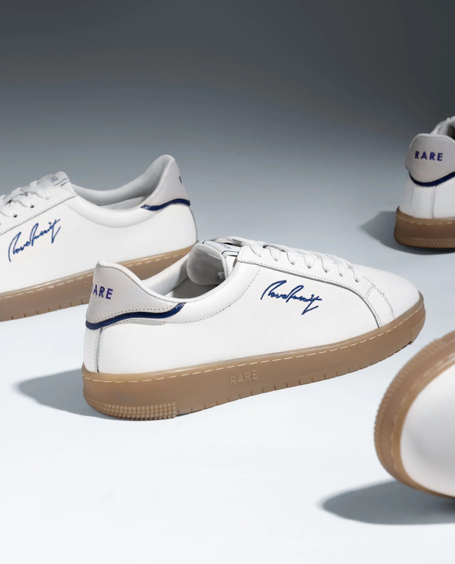 Rare Rabbit Men Elliot White Genuine Leather Embroidered Signature Low-top Lace-Up Closure Sneaker