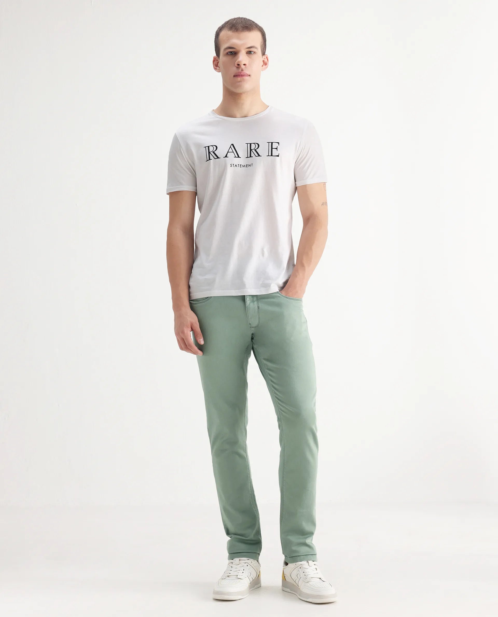Rare Rabbit Men's Essen Light Green Cotton Plain Hawk Slim Fit Jeans