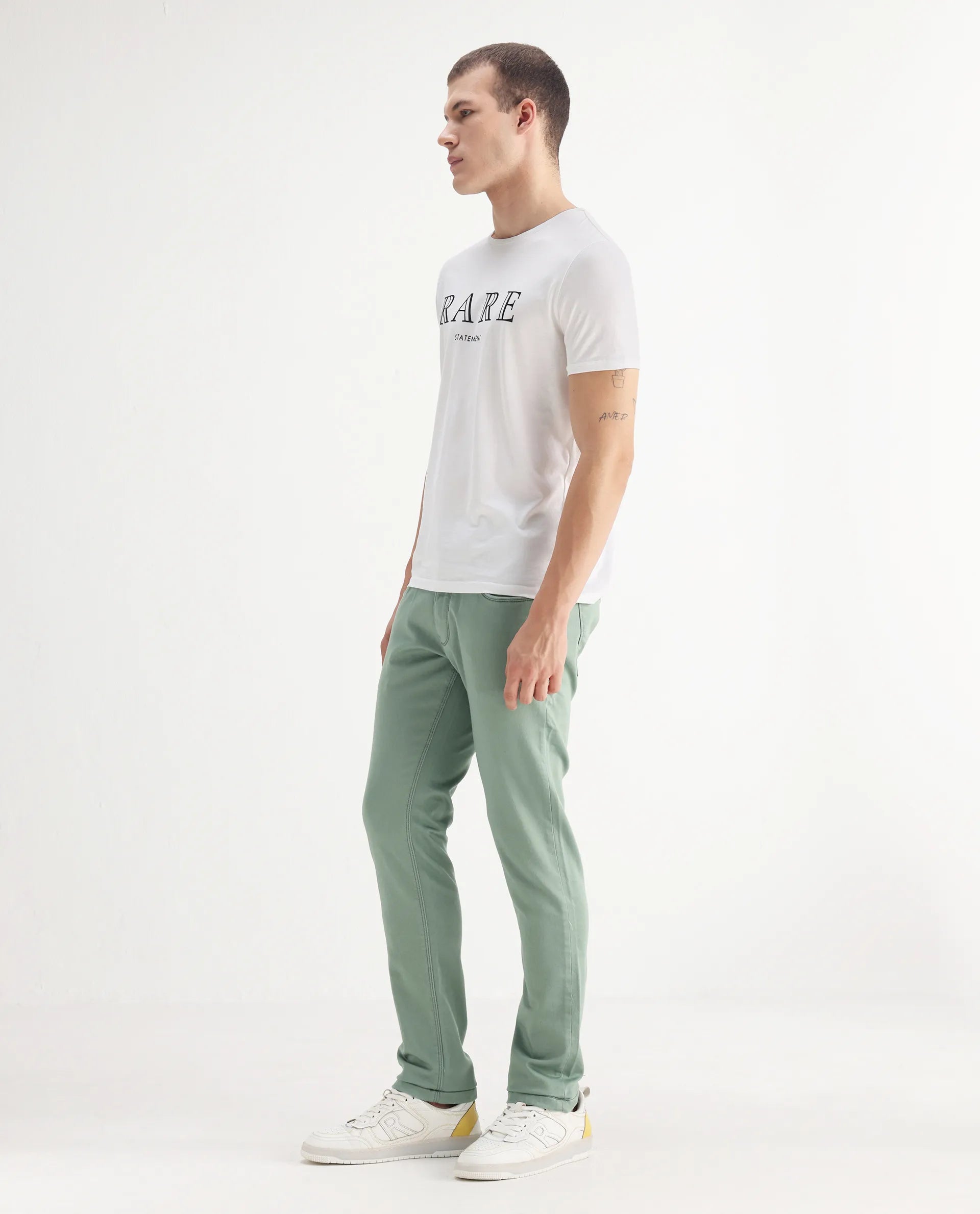 Rare Rabbit Men's Essen Light Green Cotton Plain Hawk Slim Fit Jeans