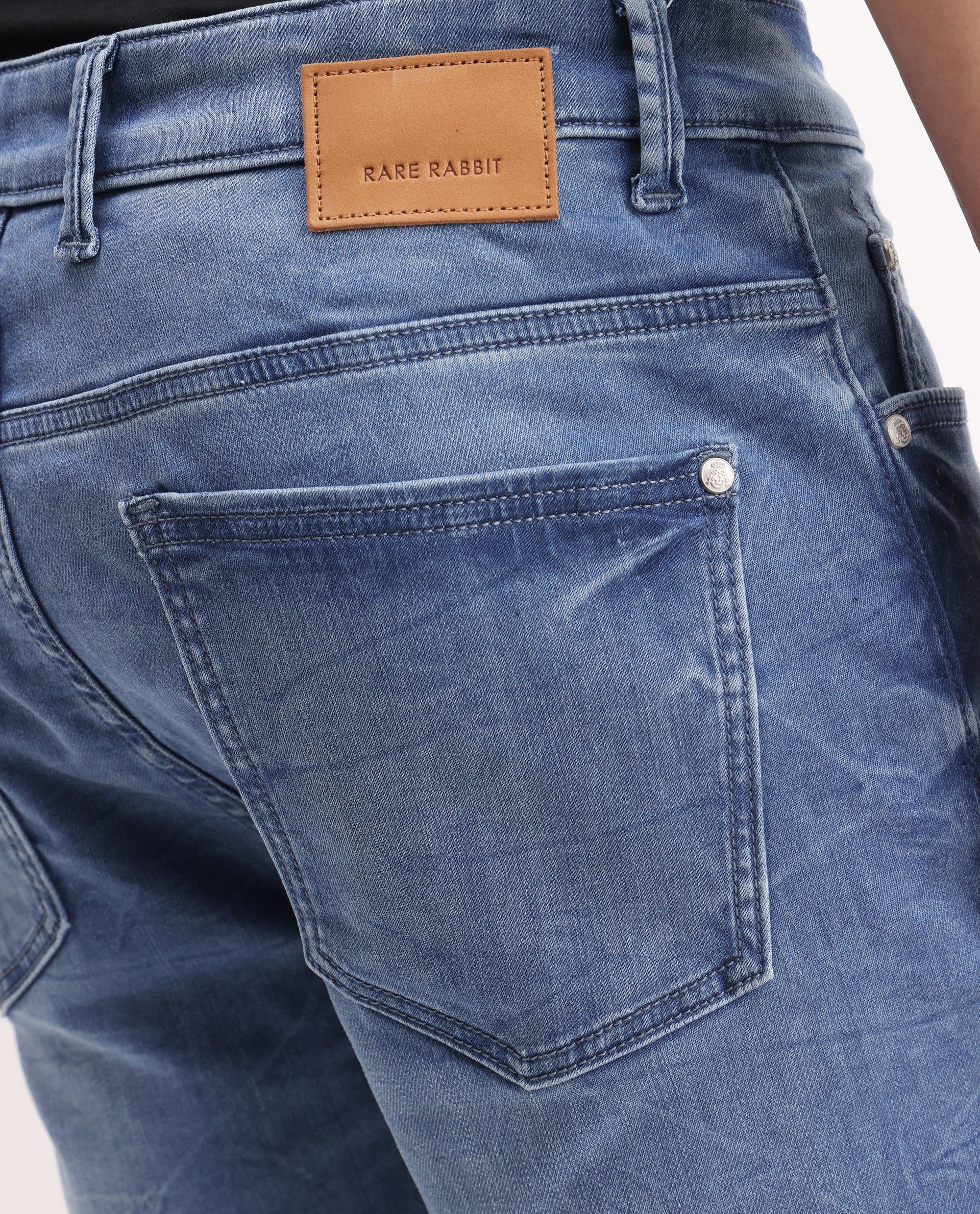 Rare Rabbit Men's Felix-K Blue Cotton Blend Plain Kurt Carrot Fit Jeans