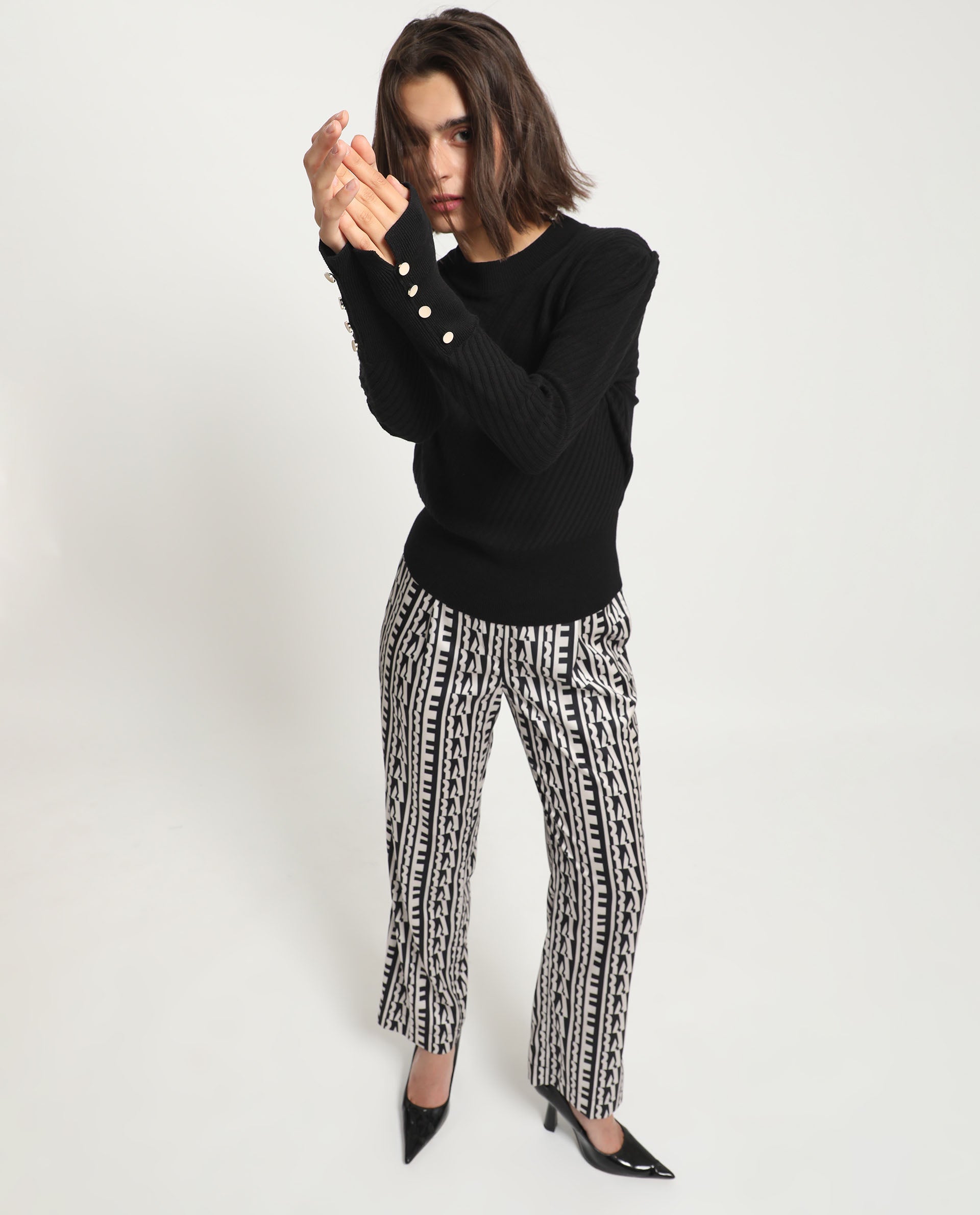 Rareism Women Fischer Black Viscose Fabric Full Sleeves Knee Length Regular Fit Solid High Neck Sweater