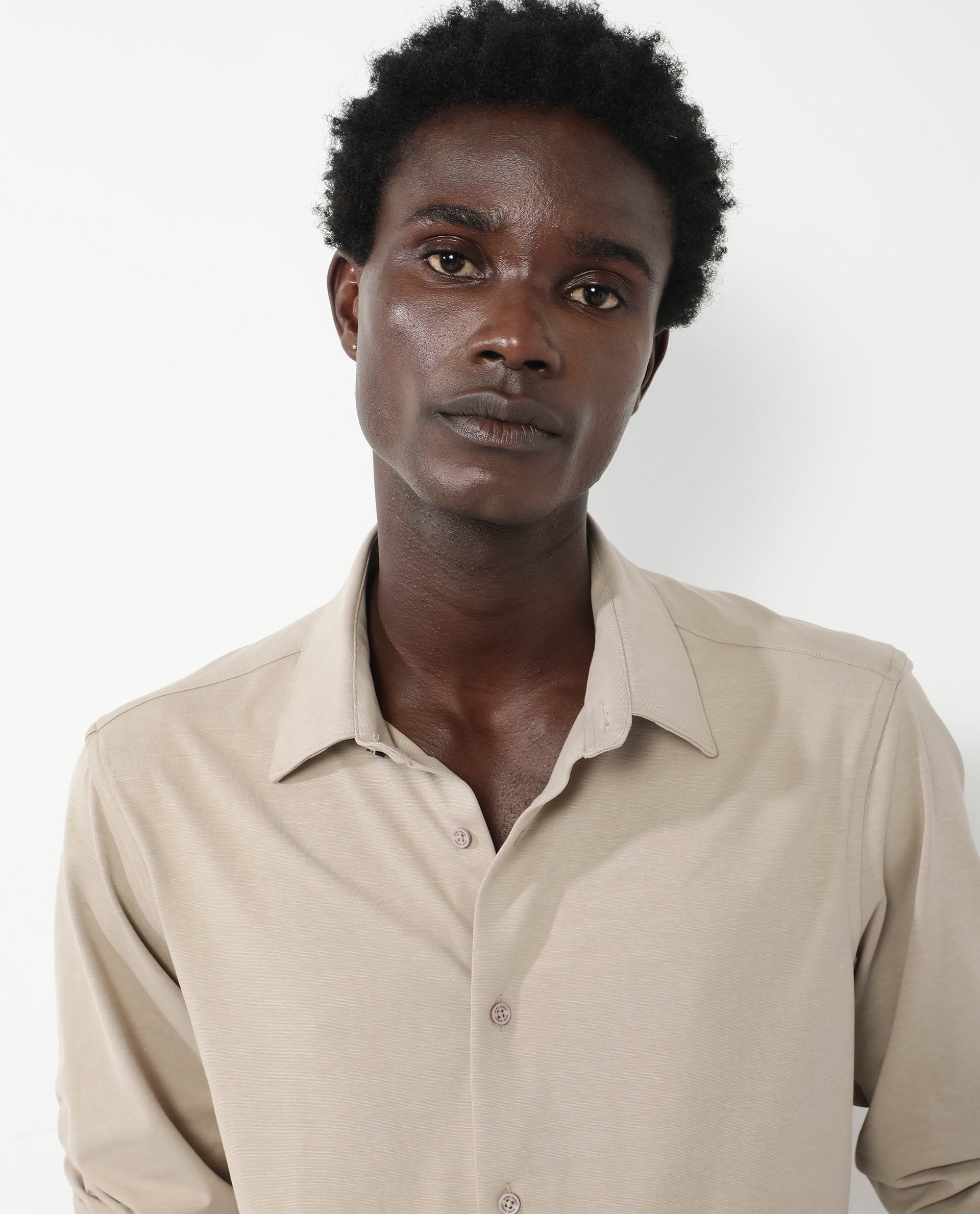 Rare Rabbit Men's Flyknit Beige Cotton Polyester Fabric Full Sleeves Knitted Solid Shirt